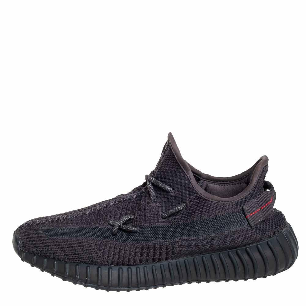 Catch on with the trend of designs from the Yeezy x Adidas collaboration with this pair of Boost 350 V2 sneakers. The knit fabric pair features great cushioning, lace-ups on the vamps, and tubular rubber soles. This pair comes in black with pull