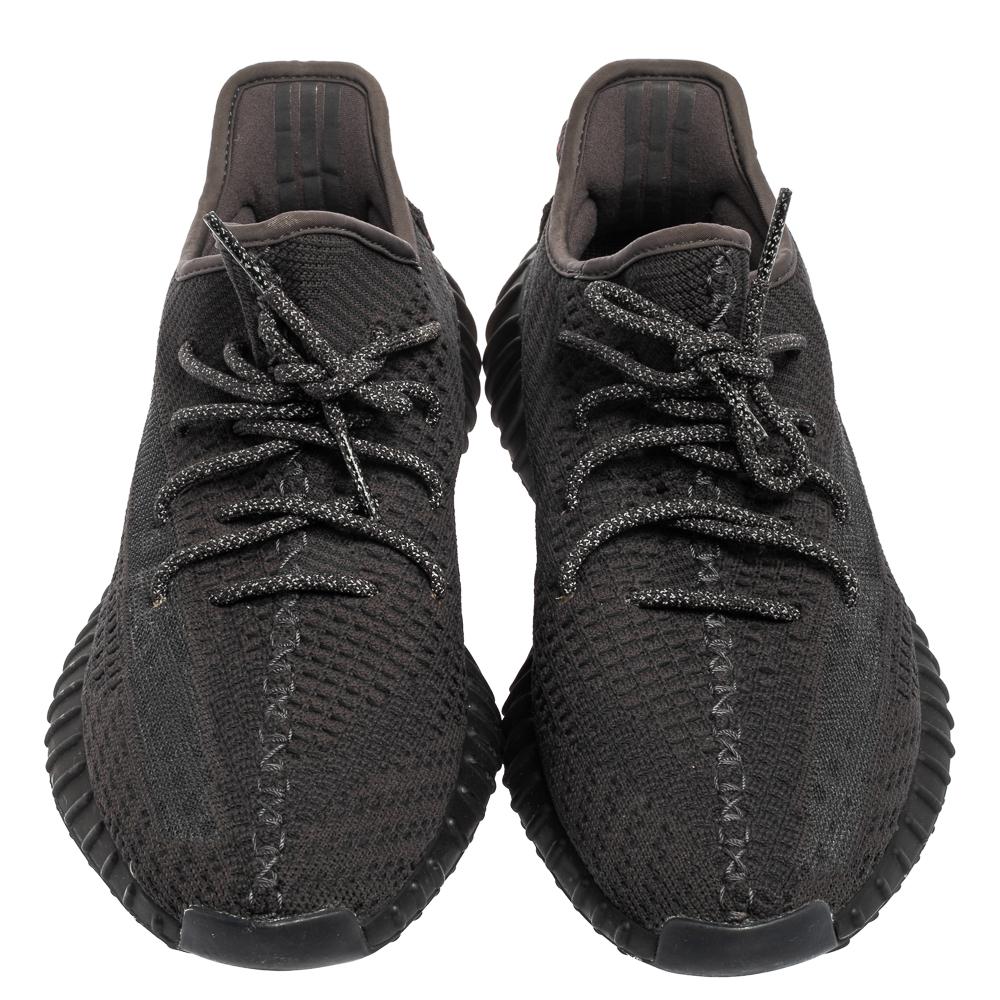 Coming from one of the most sought-after collaborations, Yeezy x adidas, these Boost 350 V2 sneakers are truly a classic pair to own! They are created using black knit fabric with a lace-up fastening attached to their vamps. Their fabric-lined
