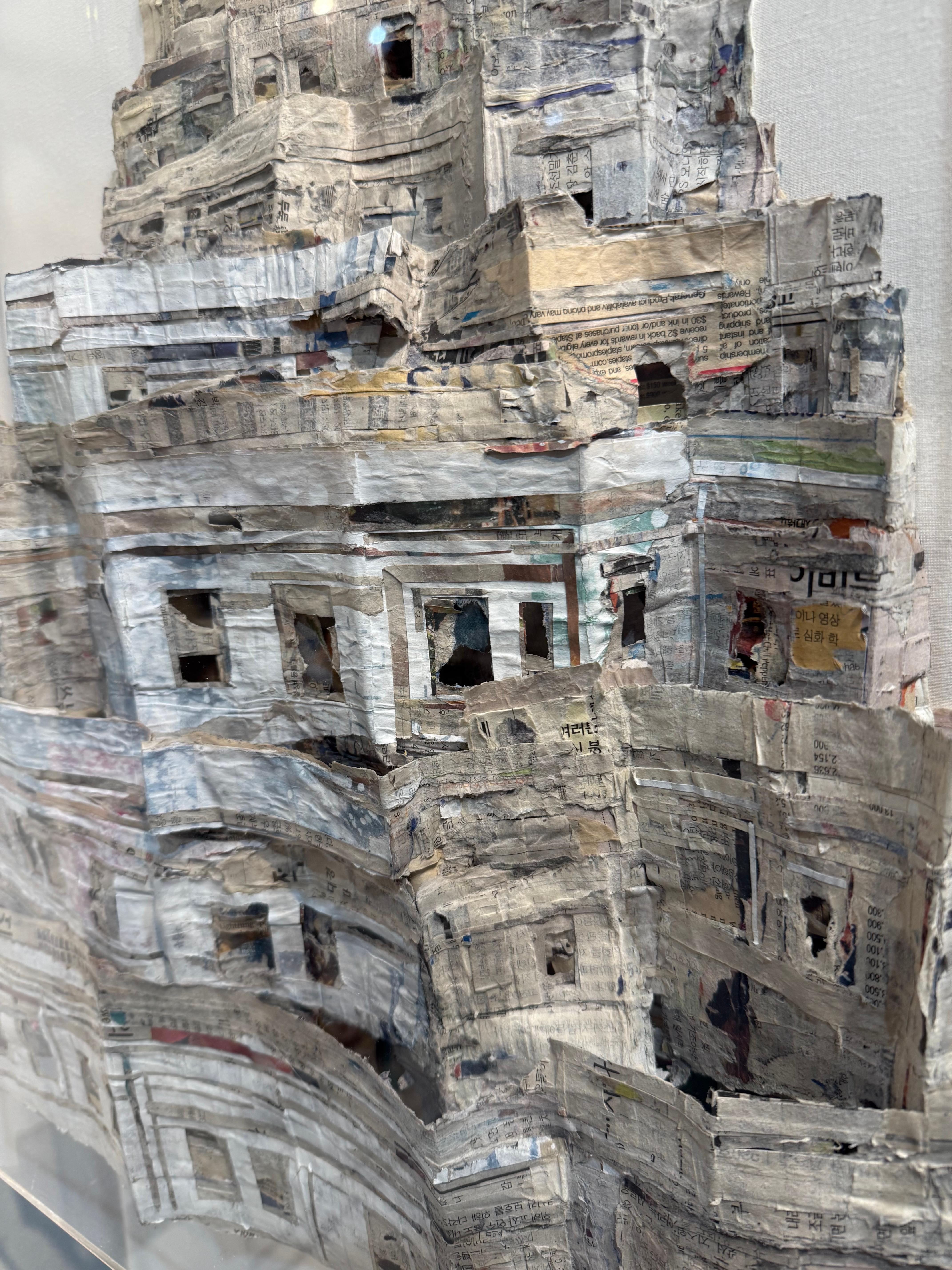 Newpaper on canvas 3D-collage set in An Acrylic Box

In the hands of Yeji Moon, ordinary materials are transformed into beautiful and complex collages that powerfully recall childhood nostalgia and the rapidly changing world. Inspired by her