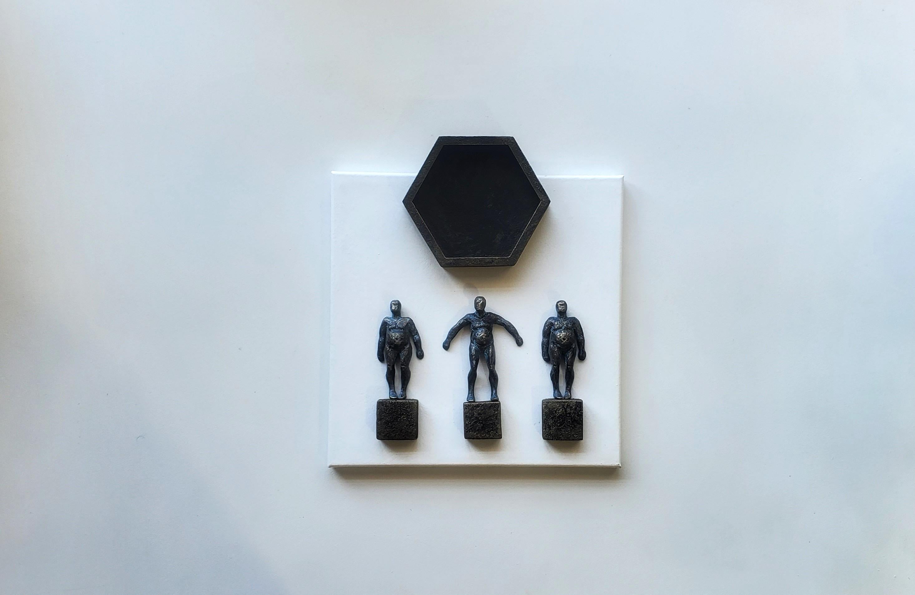 <p>Artist Comments<br />Three figures stand on floating squares. Although they are separate, they maintain connection and balance. A large hexagon on top resembles a sun. The white background highlights the perfect, divine, and pure union,