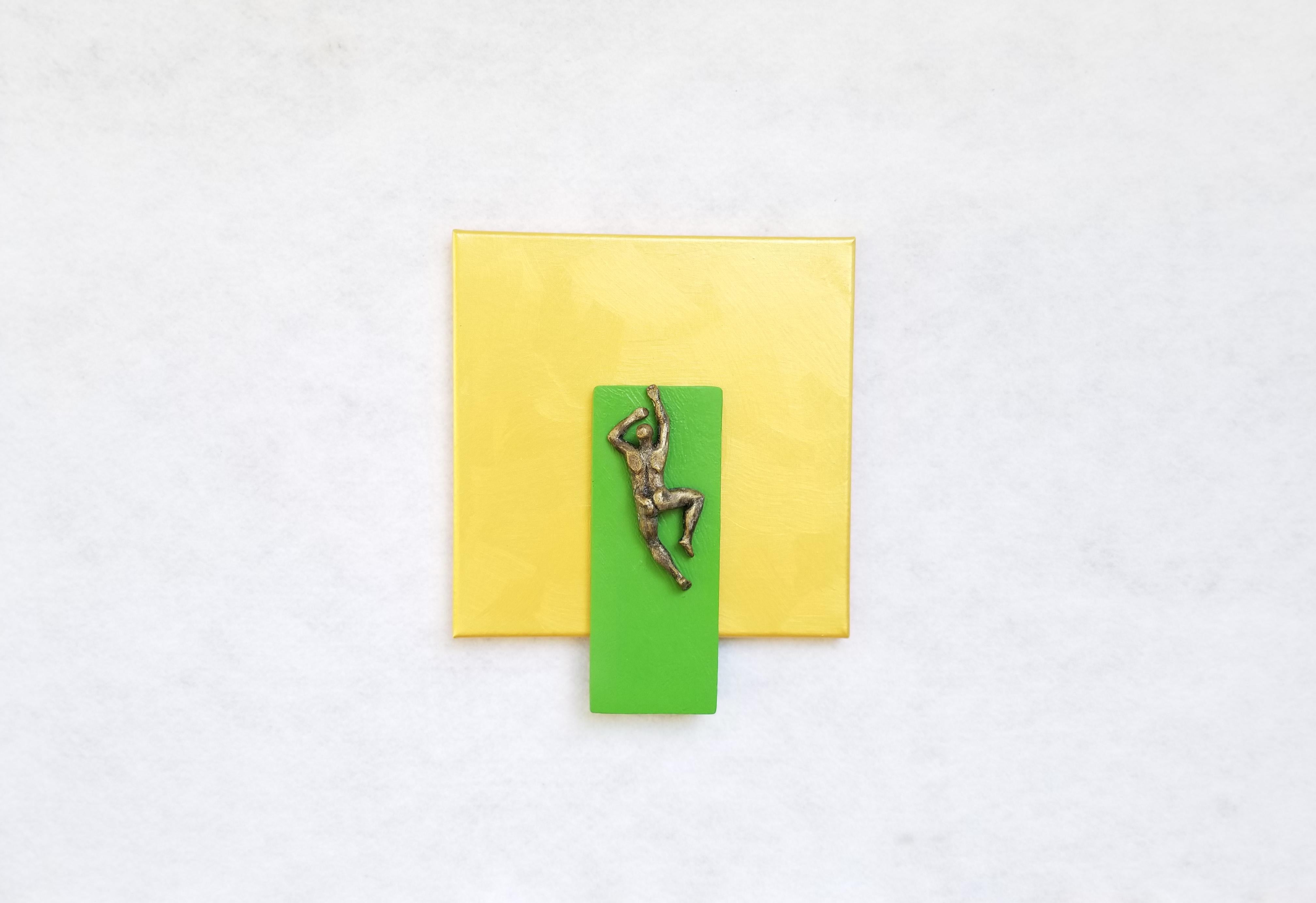 <p>Artist Comments<br>A lone figure attempts to climb a green structure adhered to a golden panel. Artist Yelitza Diaz adds the human form to geometric designs to challenge the basic idea of minimalism. She presents a conceptual representation of