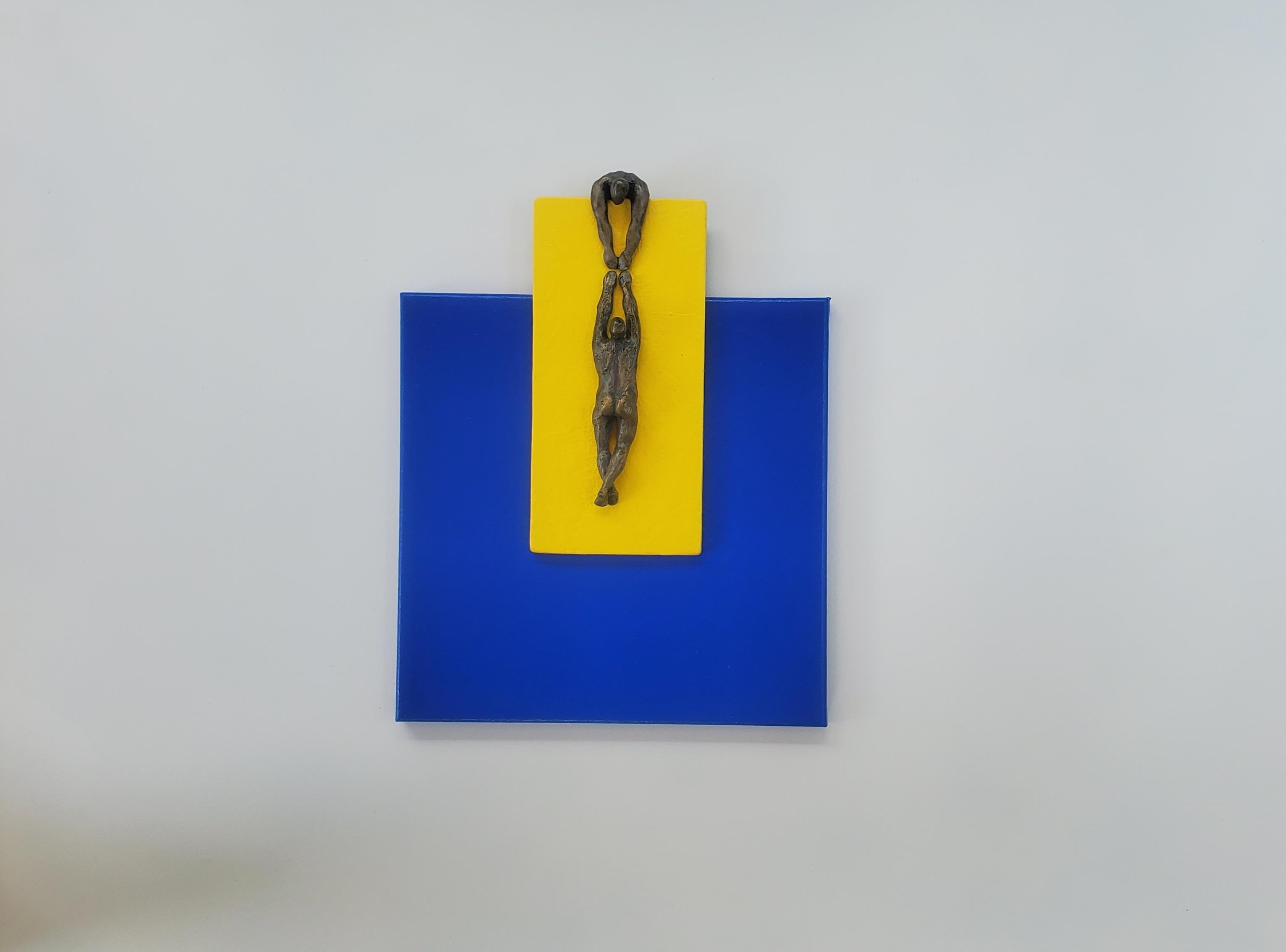 <p>Artist Comments<br>Artist Yelitza Diaz presents a figure helping its companion climb a steep ledge. Part of her long ongoing Climbers series reiterated with overlapping canvases and wood that interact with various primary colors. Central to her