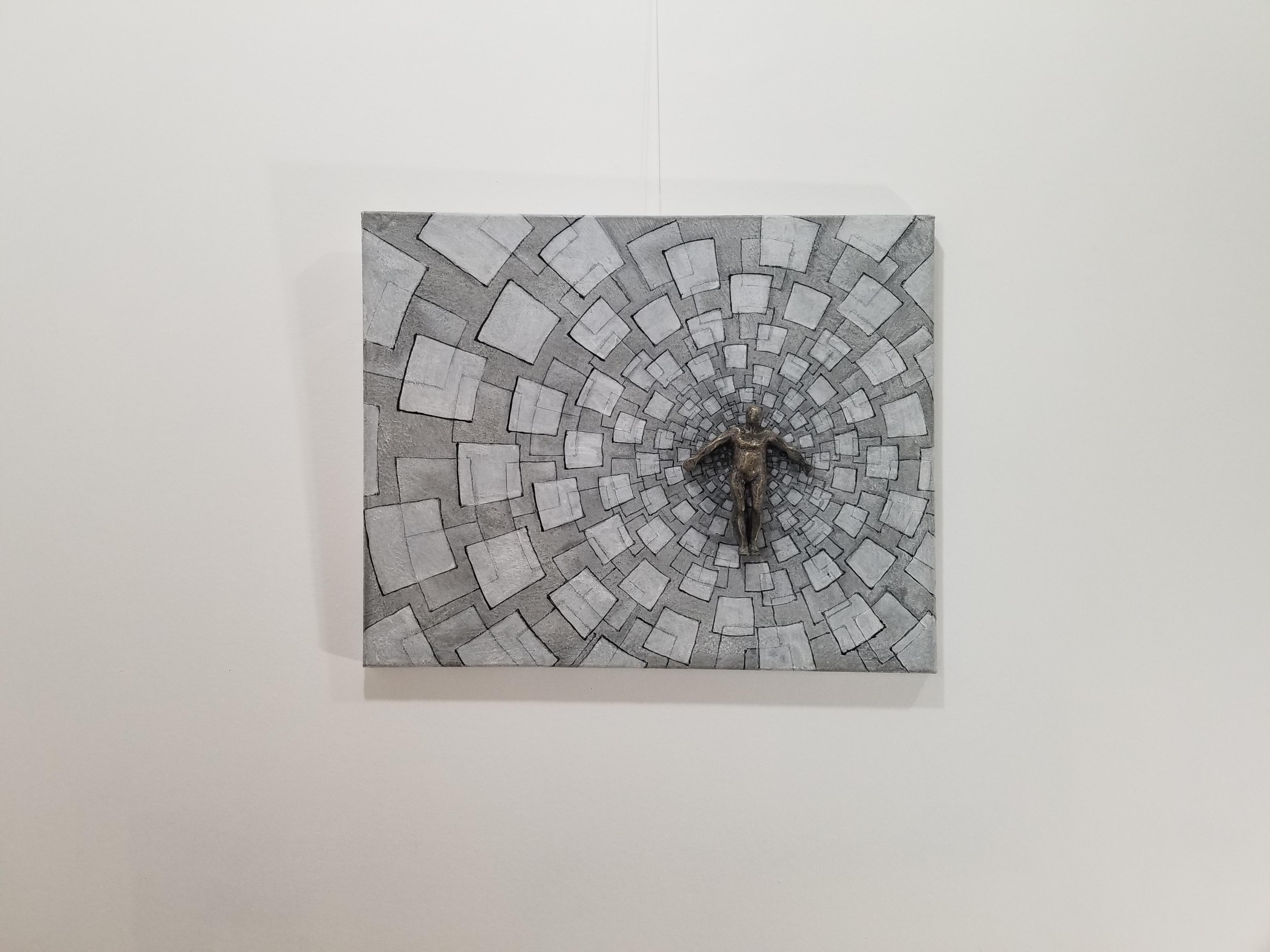 <p>Artist Comments<br />Artist Yelitza Diaz presents a metallic figure as the central point, with the background drawn by hand and shaded to project the sensation of depth. Geometric structures interlace in repeating patterns, revealing a