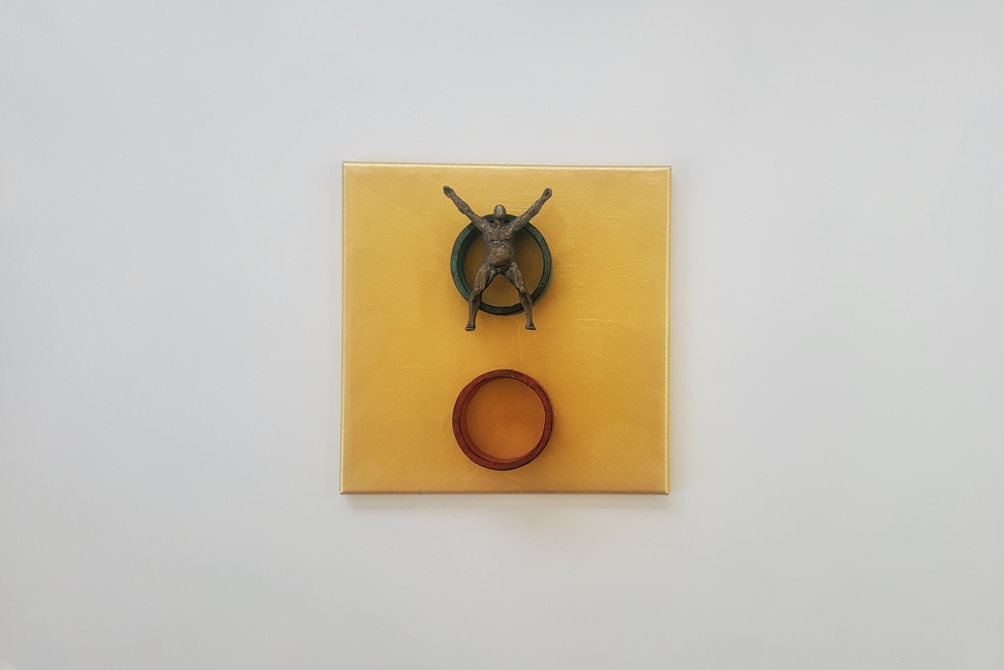 <p>Artist Comments<br>Inspired by minimalism, artist Yelitza Diaz presents a compelling piece featuring a bronze-colored figure on a blue circle. She creates a new discourse with geometric structures that allows her to identify even more with the