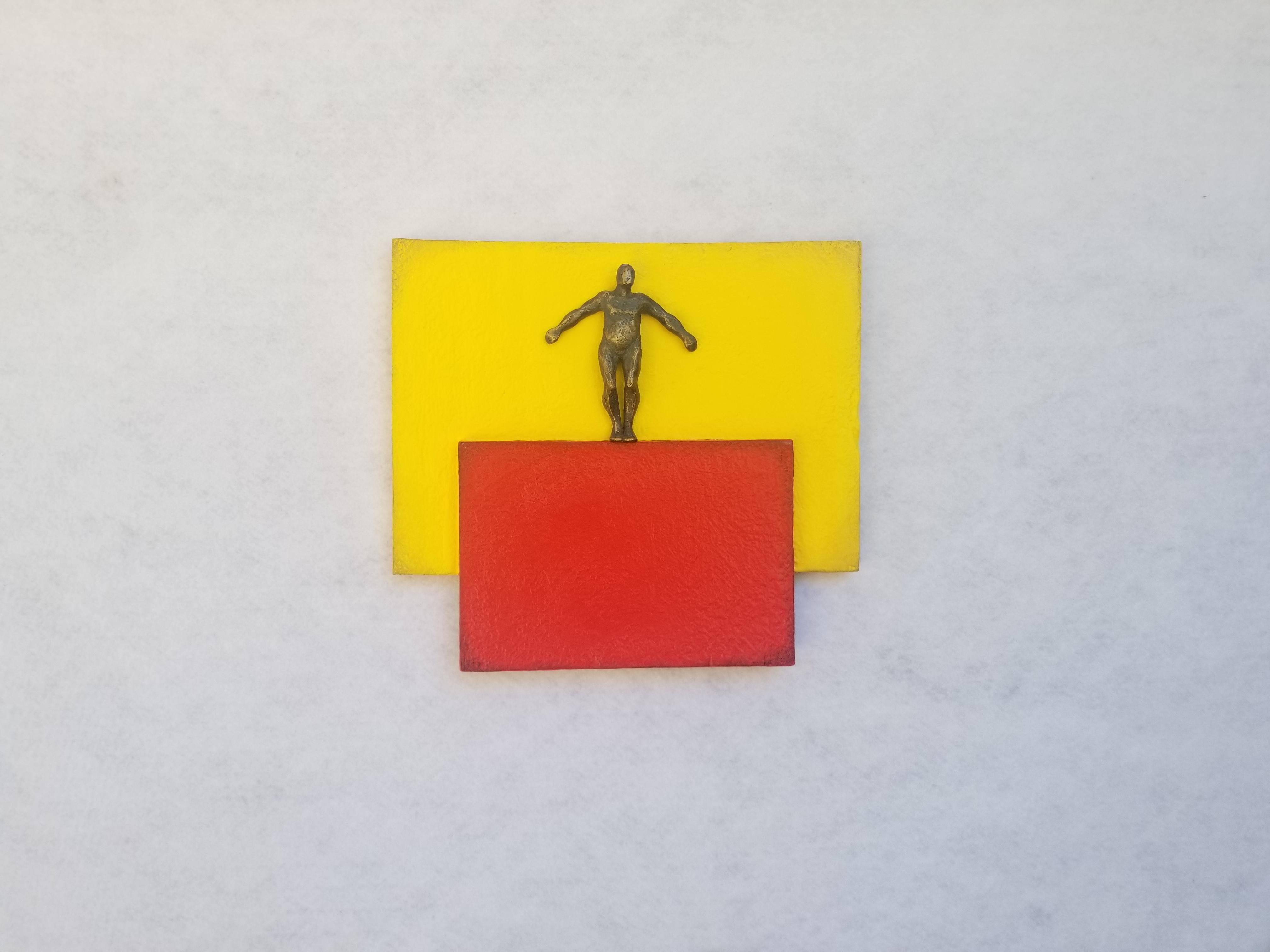 <p>Artist Comments<br />Using wooden modules painted in solid shades of red and yellow, artist Yelitza Diaz builds a base influenced by Kazimir Malevich. She challenges the minimalistic approach by adding the human form to the compositionâ€”a
