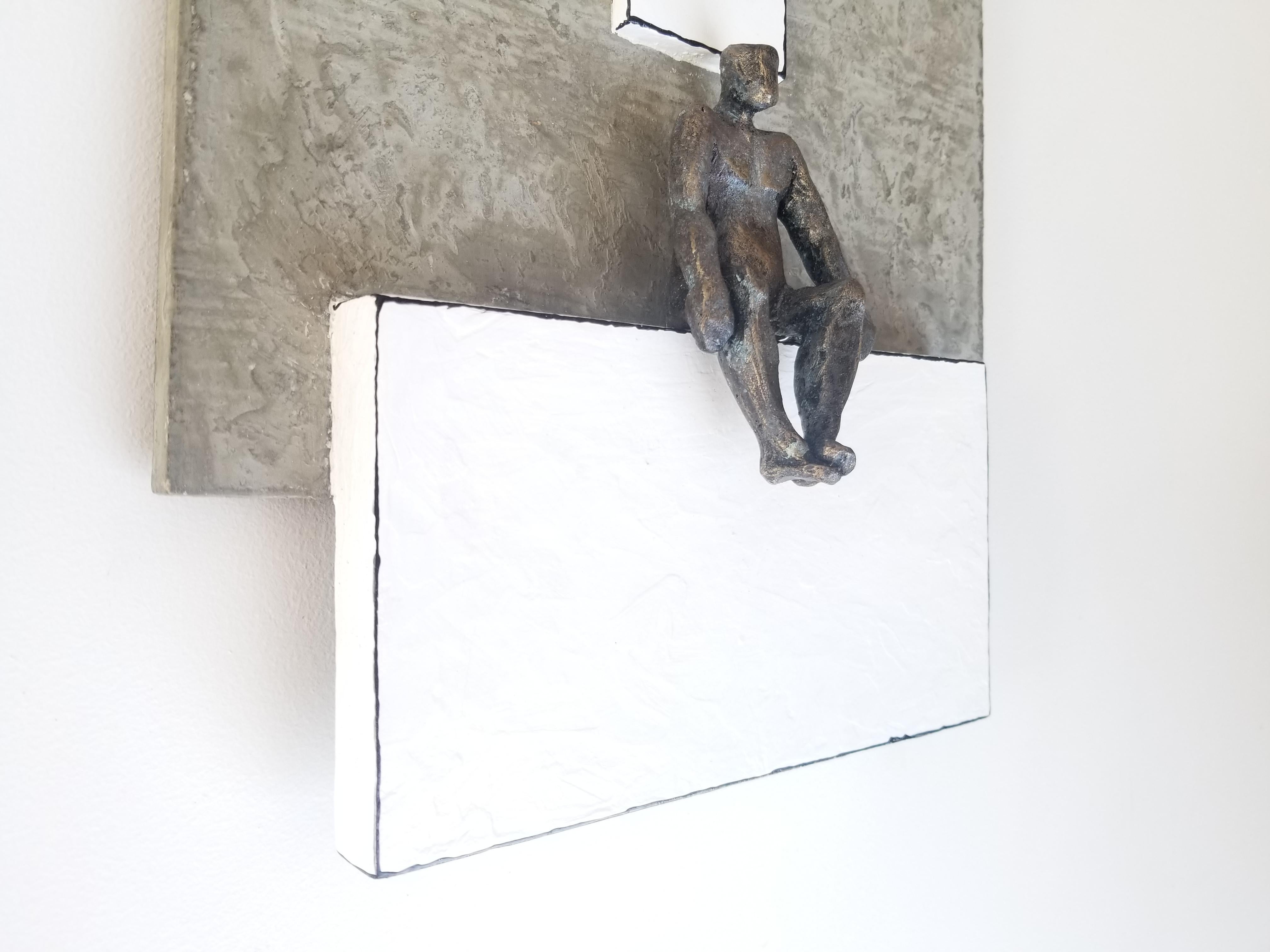 <p>Artist Comments<br>Artist Yelitza Diaz exhibits a metallic figure sitting on a bold white rectangle with another vertical rectangle directly above it. A modern depiction of an individual's connection to the universe that surrounds him as a