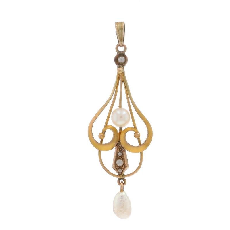Era: Art Deco
Date: 1920s - 1930s

Metal Content: 10k Yellow Gold

Stone Information

Natural Pearls

Style: Lavaliere
Theme: Teardrop Scroll

Measurements

Tall (from stationary bail): 1 19/32