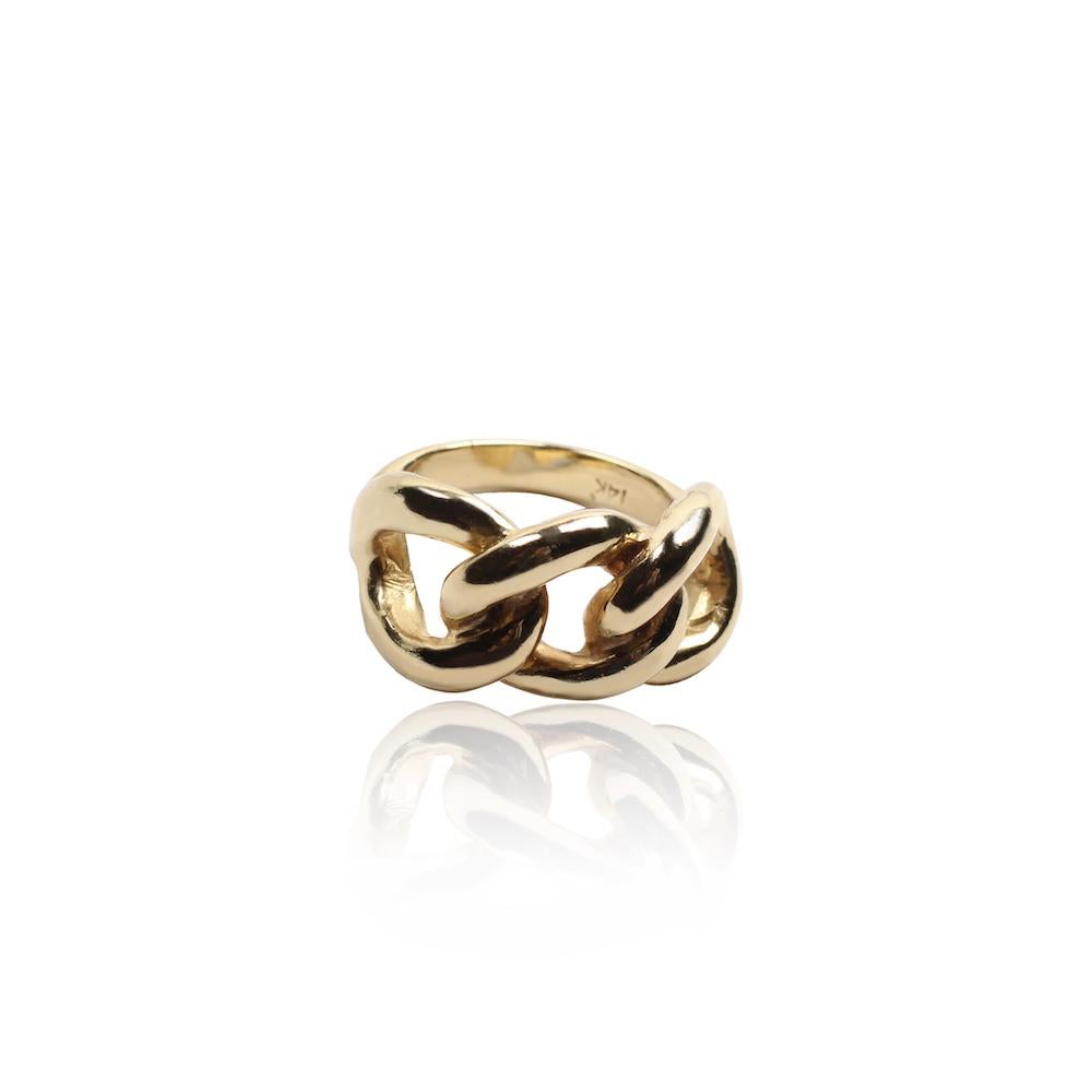 This unique handmade ring is the representation od 3 connected knots on a ring, symbol of perfection, connection, and eternal love. The ring feels heavy and strong and its a perfect bold statement piece from day to night. 

* 14k Gold
* Size 7 USA