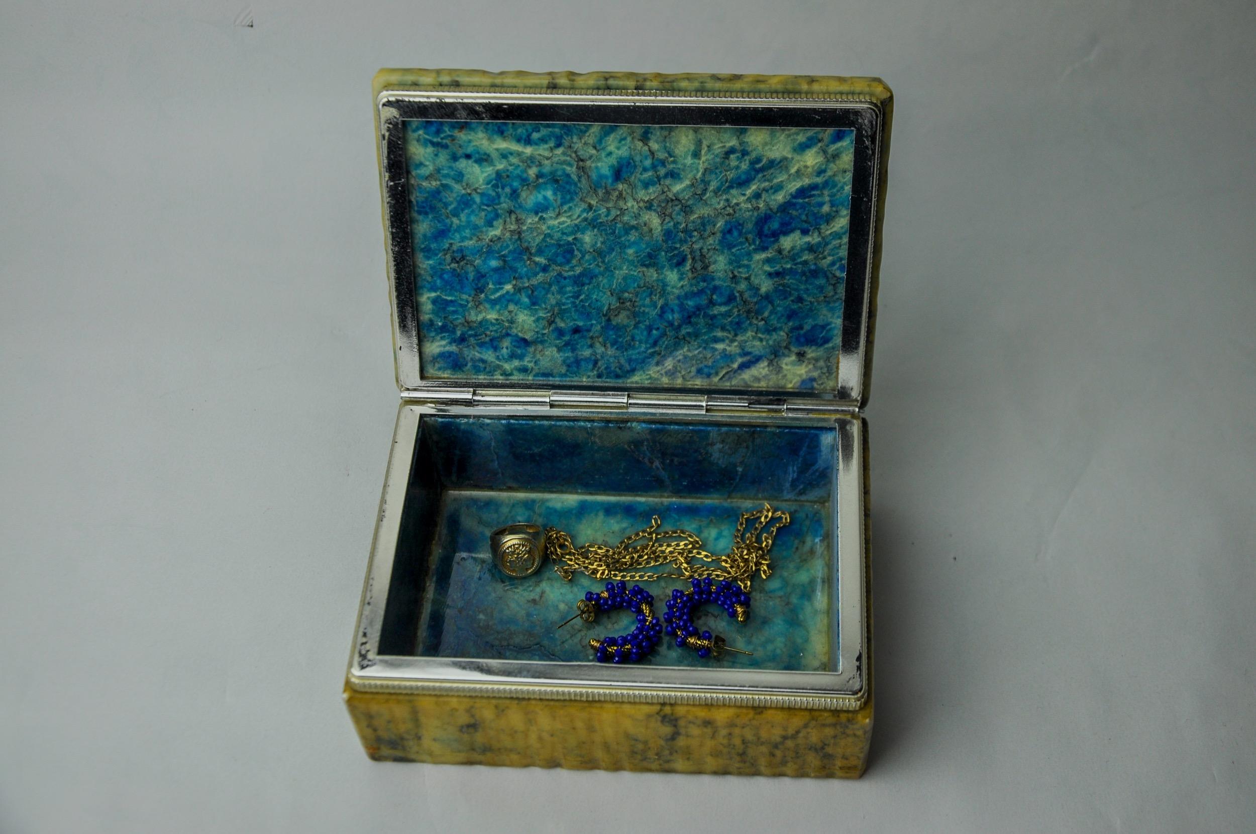 Superb alabaster box designed and produced by Romano Bianchi in Italy in the 1970s. Handcrafted yellow and bluish alabaster box and chrome metal structure. Decorative object that will bring a real designer touch to your interior. Very beautiful