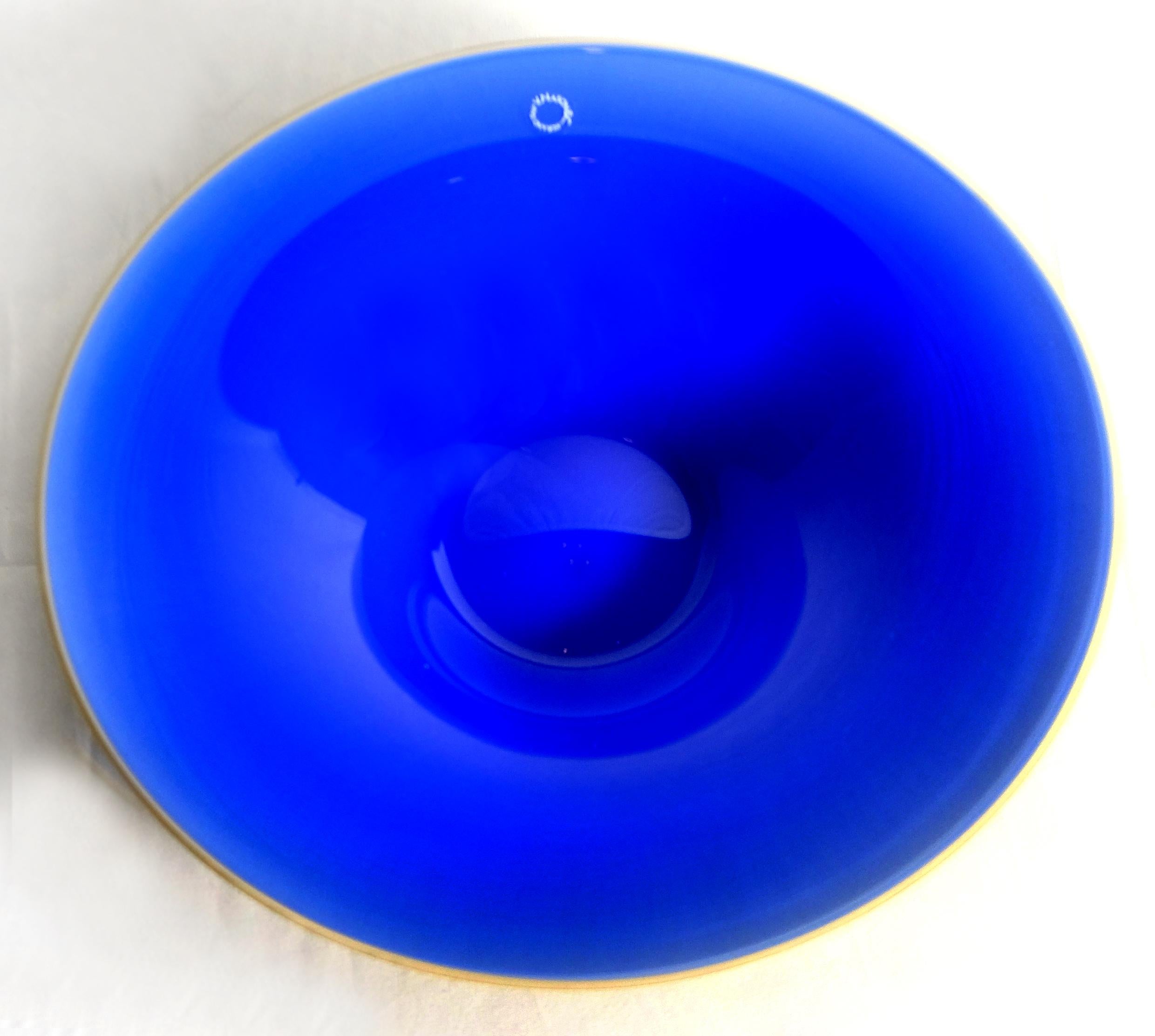 V. Nason & C., Italy Yellow and Blue Murano Glass Bowl

Offered for sale is a yellow and blue Murano glass bowl or serving dish by V. Nason & C. The bowl retains the original label on the rim.
Vincenzo Nason established his glassworks, Vincenzo