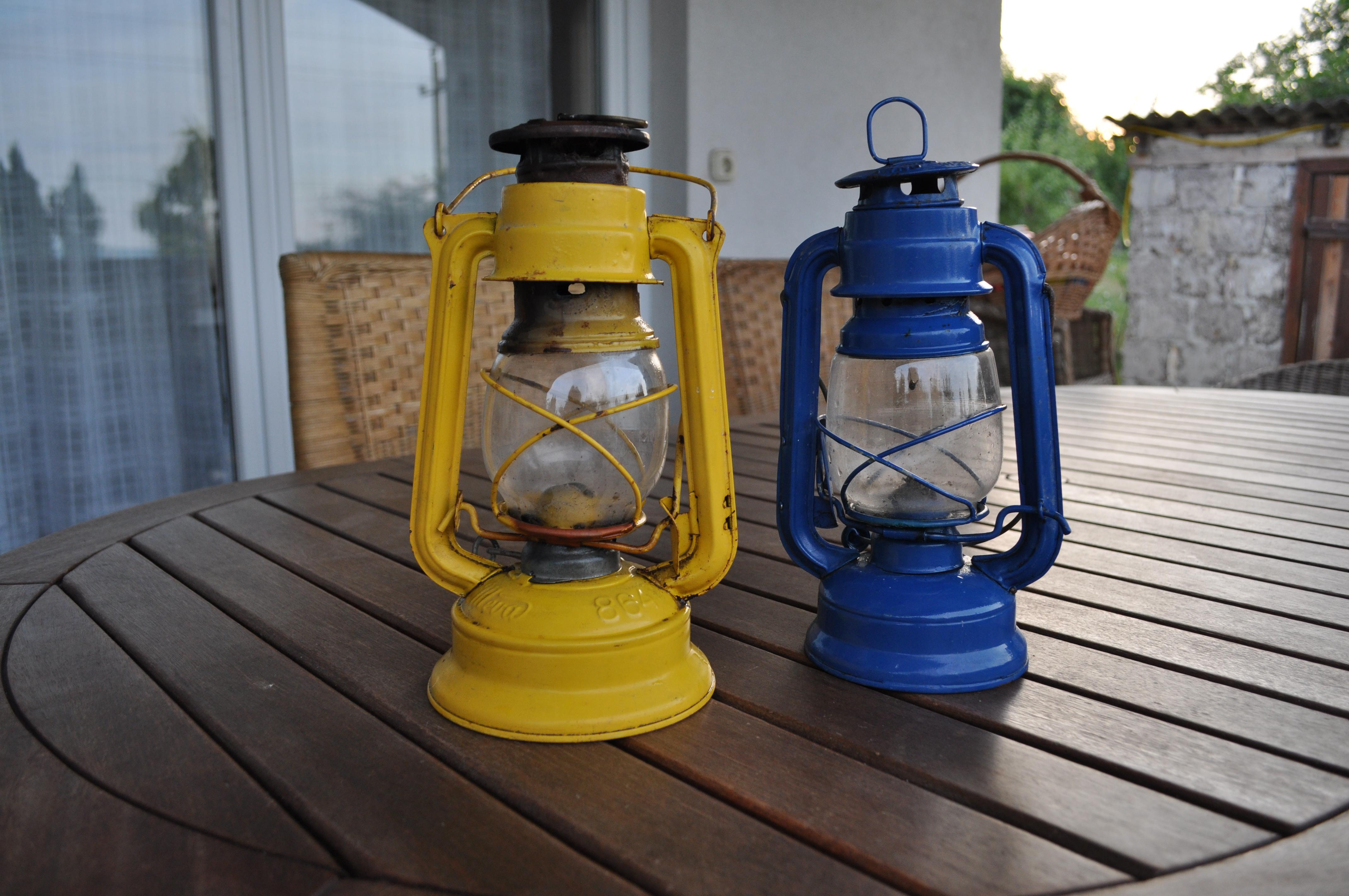 Yellow and blue Oil Lamp ,Vintage Kerosene Lantern

Rustic, worn metal and glass lantern, found in Hungary.
Length (Depth)7
Width7
Height12