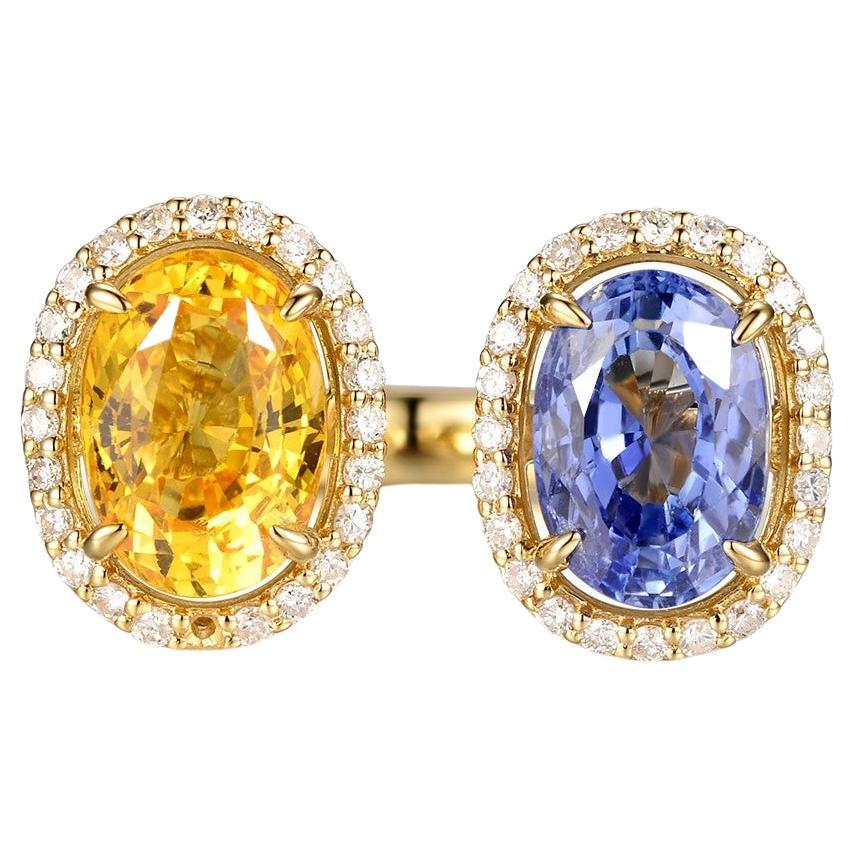 Toi et Moi-Ring aus 18 Karat Gelbgold mit gelbem und blauem Saphir im Angebot
