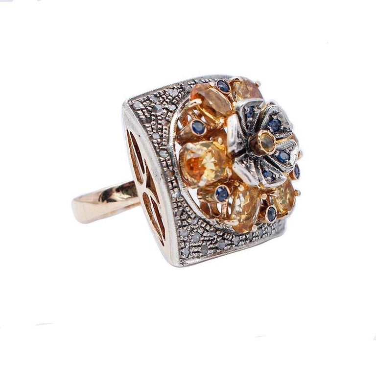 SHIPPING POLICY:
No additional costs will be added to this order.
Shipping costs will be totally covered by the seller (customs duties included).

Beautiful retrò ring in 9 karat rose gold and silver structure mounted with a flower of yellow and