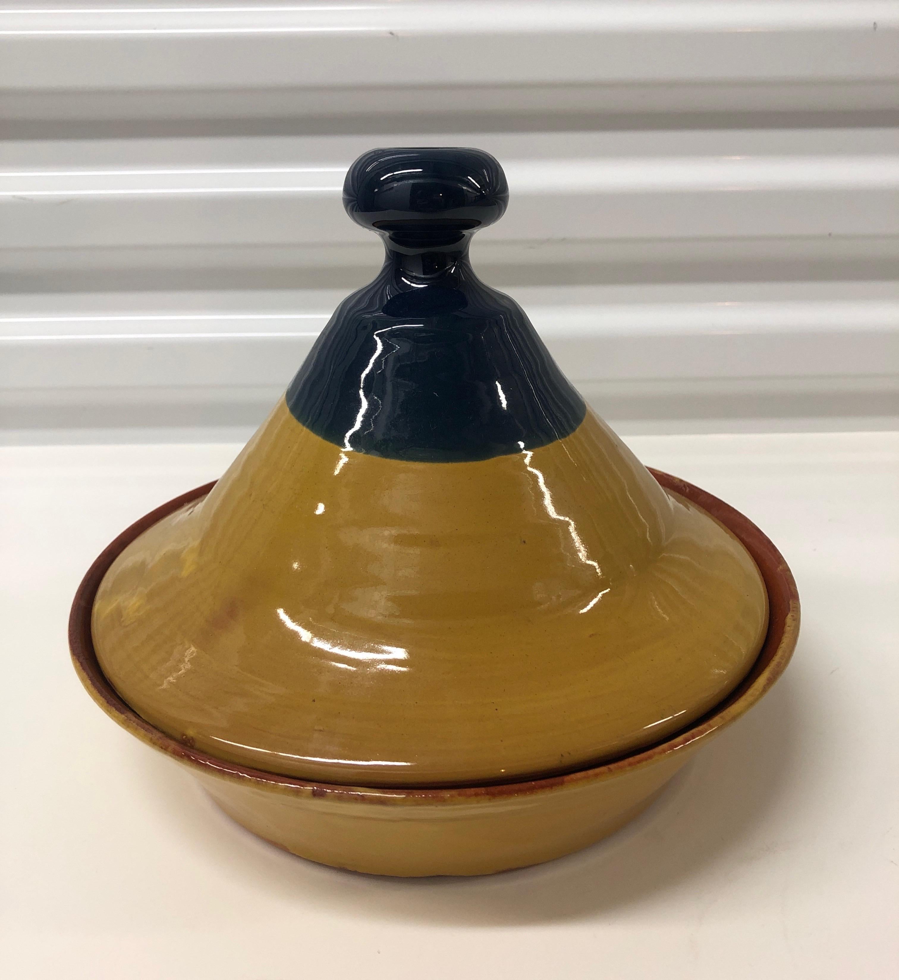 Yellow and blue Tagine serving bowl with cover.