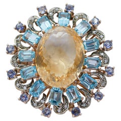 Yellow and Blue Topazs, Tanzanite, Diamonds, Rose Gold and Silver Ring.