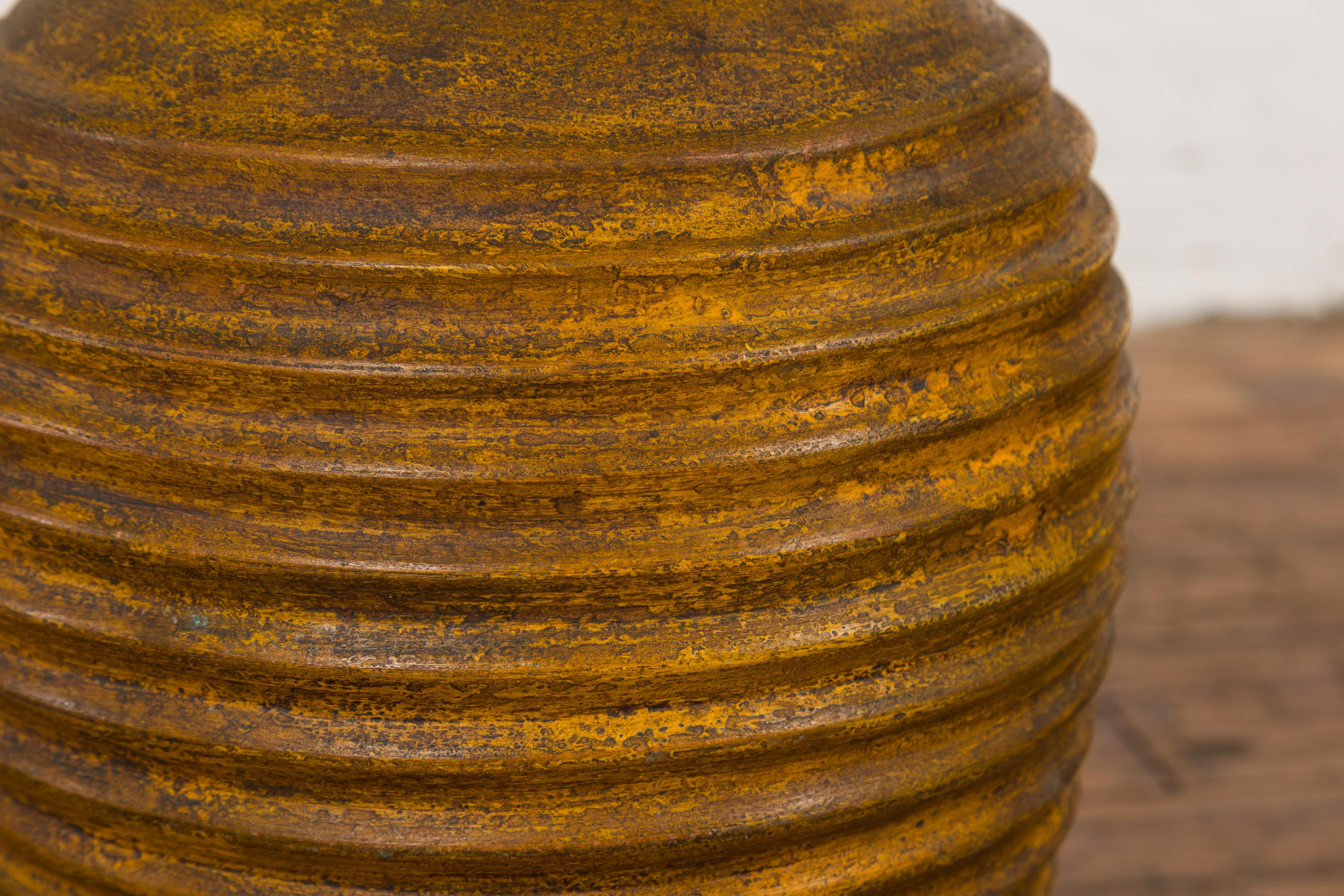 Yellow and Brown Storage Vase with Concentric Design and Rustic Character 5