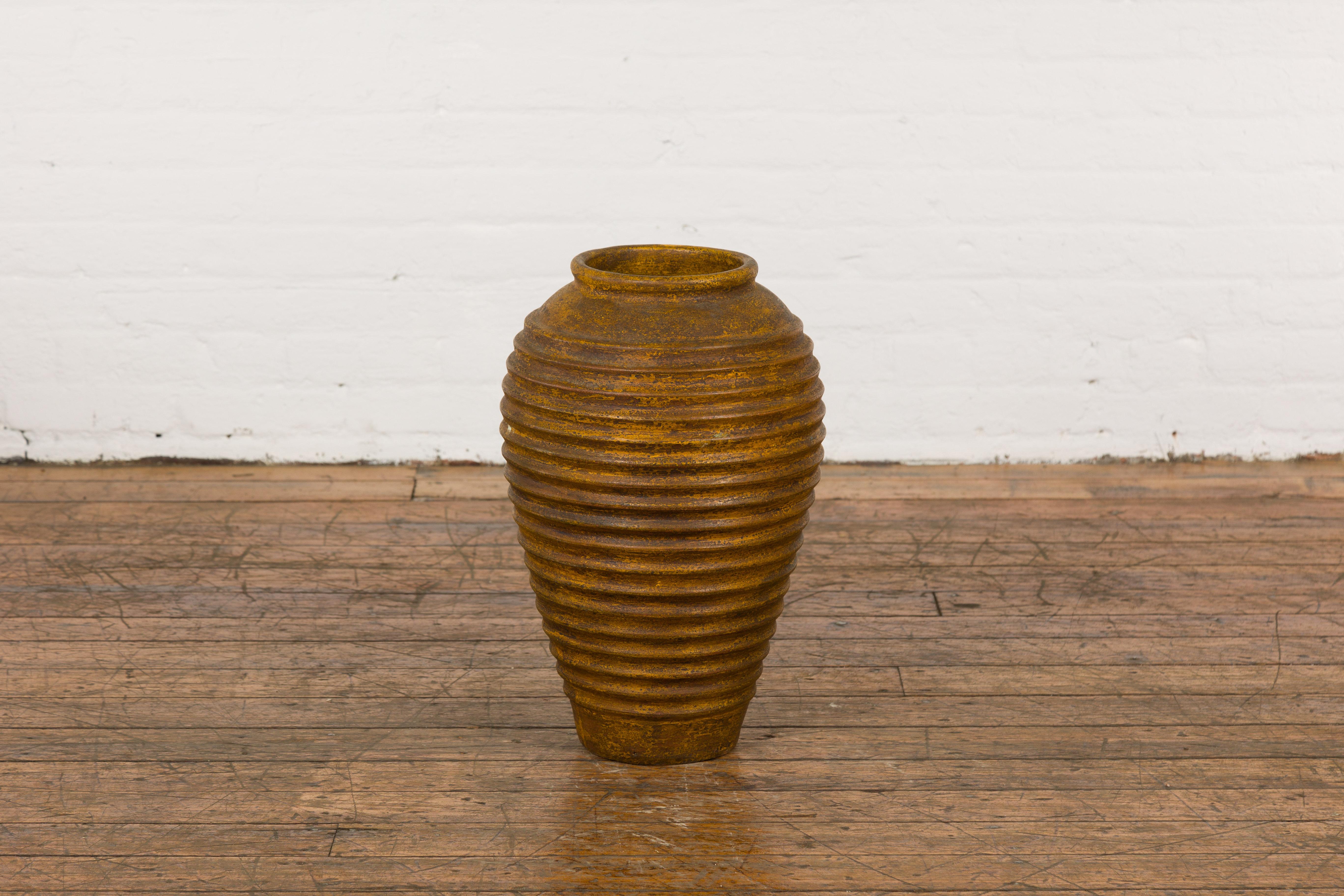 Yellow and Brown Storage Vase with Concentric Design and Rustic Character 8