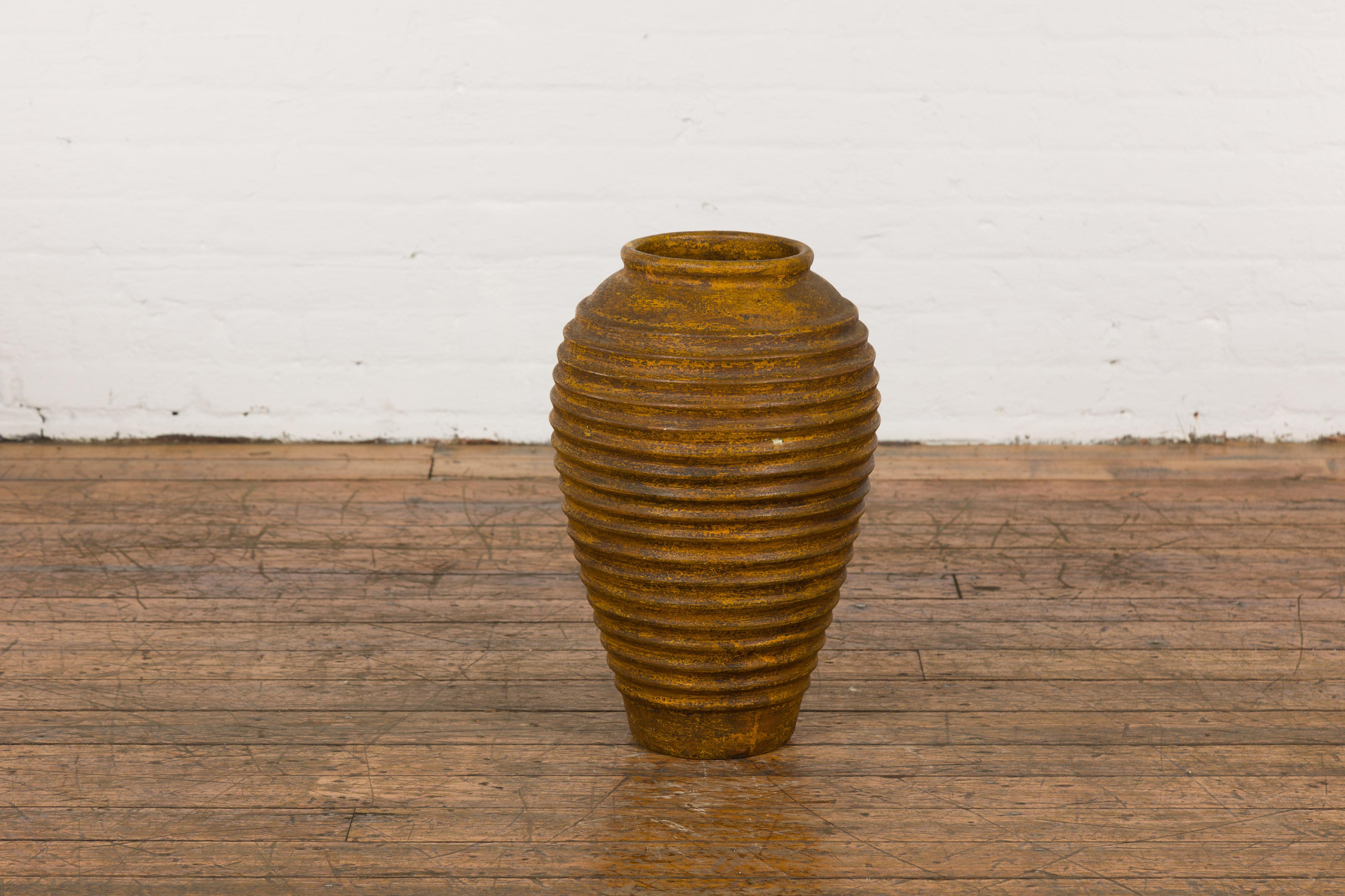 Yellow and Brown Storage Vase with Concentric Design and Rustic Character 9