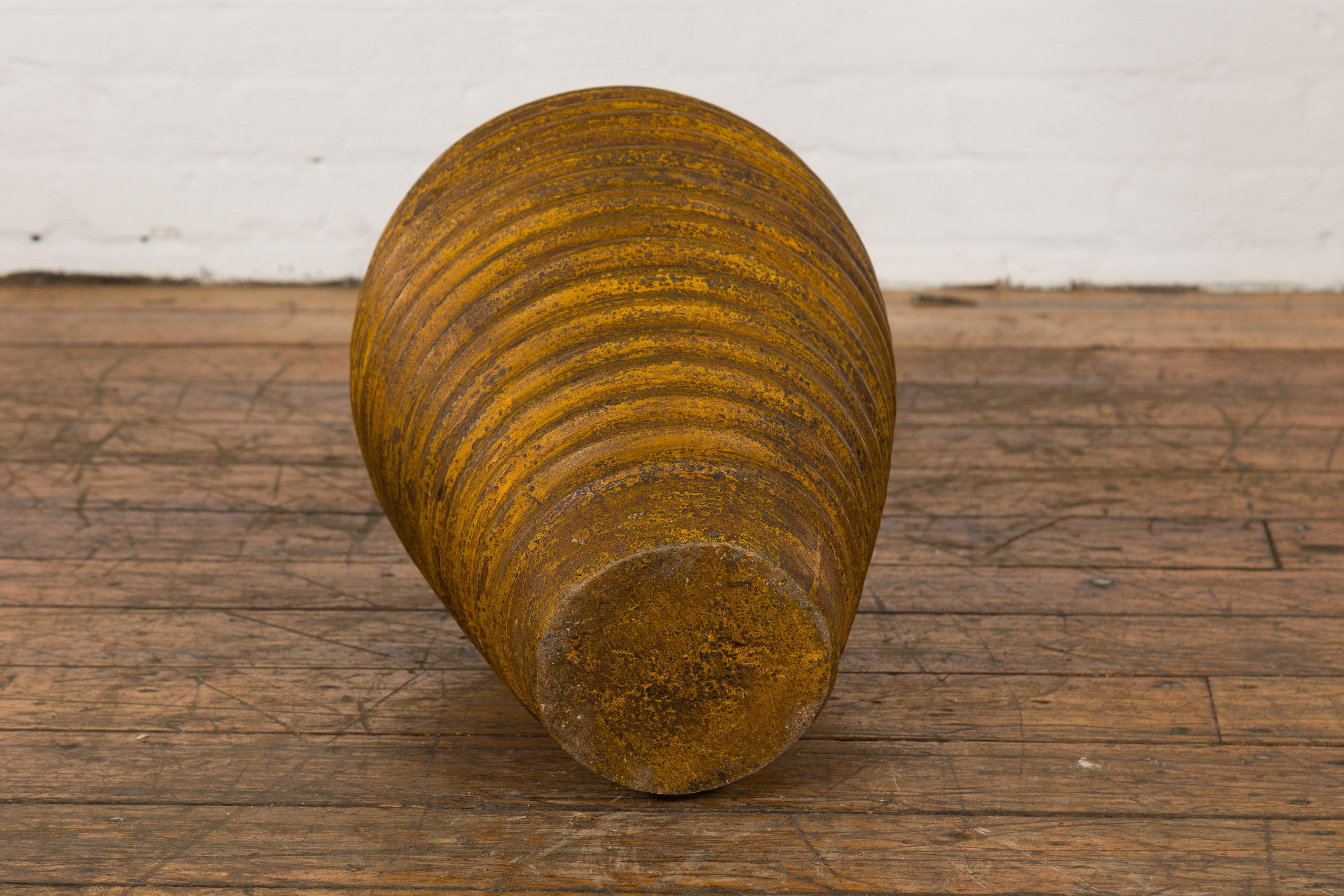 Yellow and Brown Storage Vase with Concentric Design and Rustic Character 11