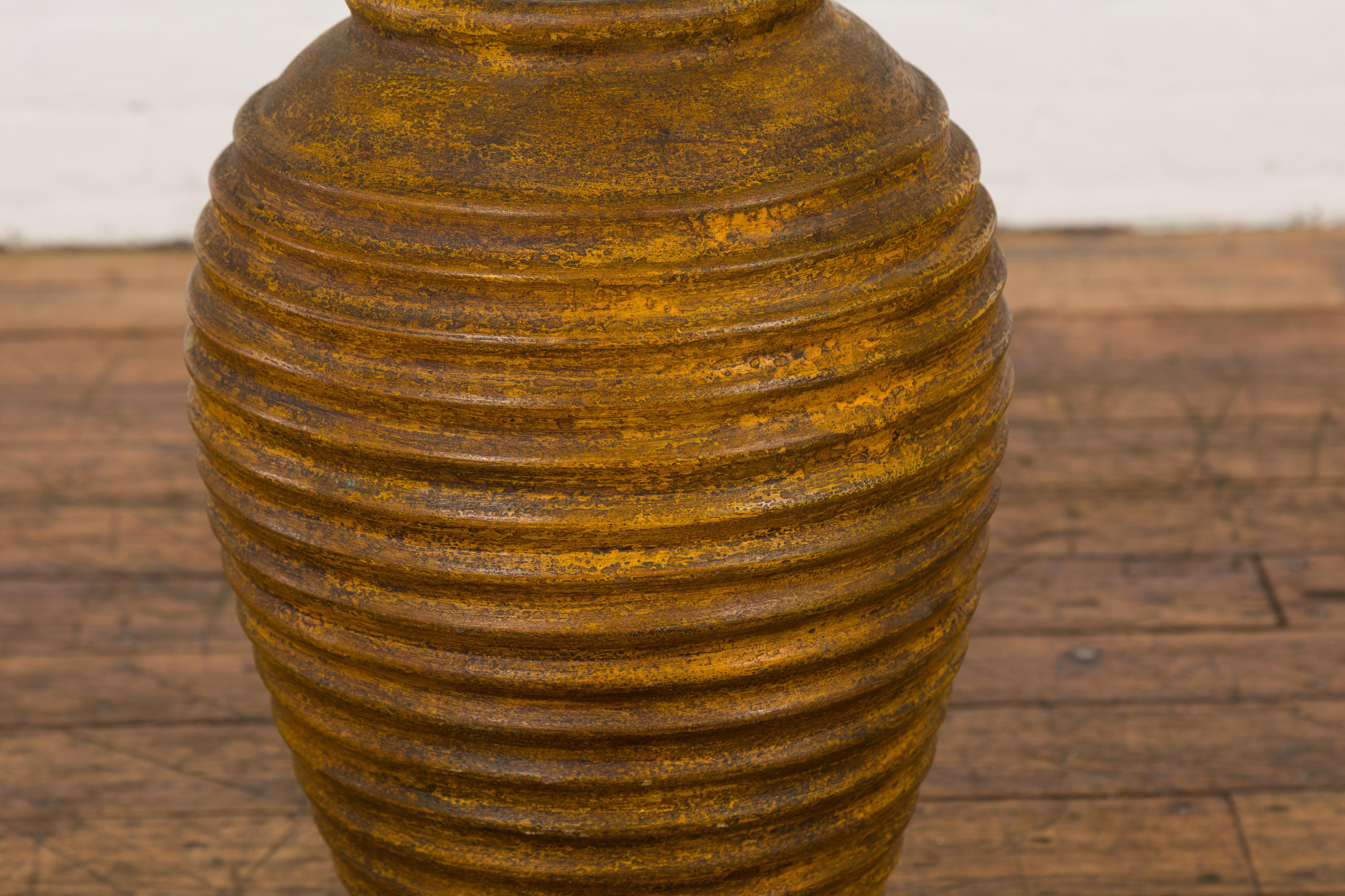 Ceramic Yellow and Brown Storage Vase with Concentric Design and Rustic Character