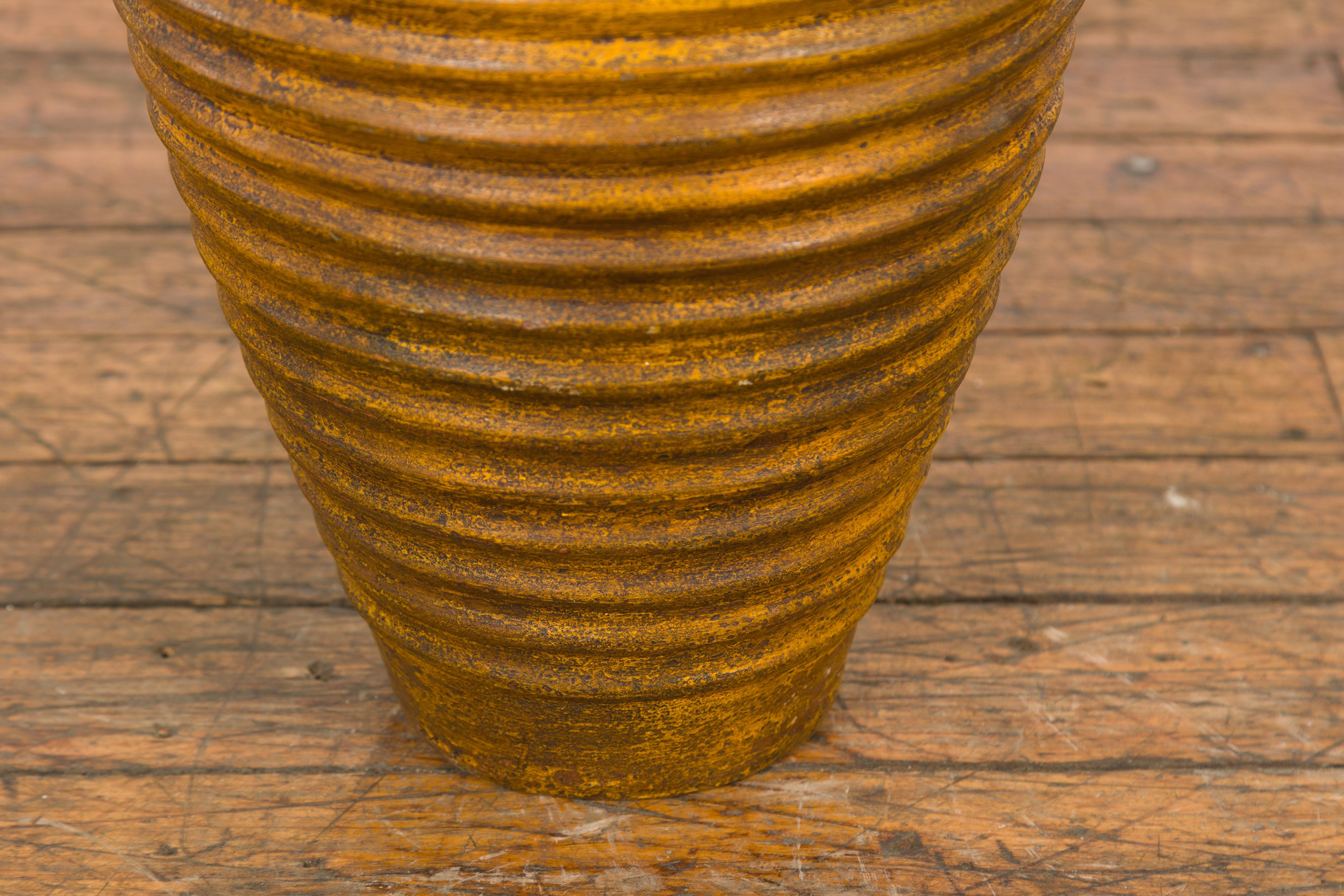 Yellow and Brown Storage Vase with Concentric Design and Rustic Character 2