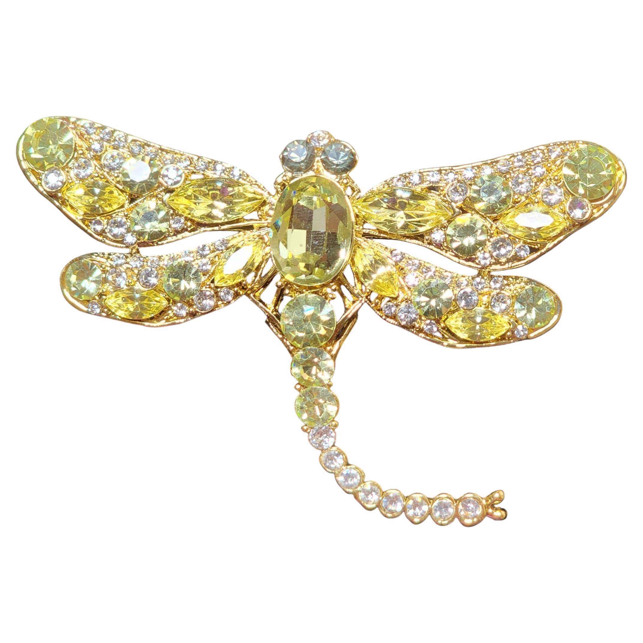 Spilla a forma di libellula con strass gialli e trasparenti e montatura in oro