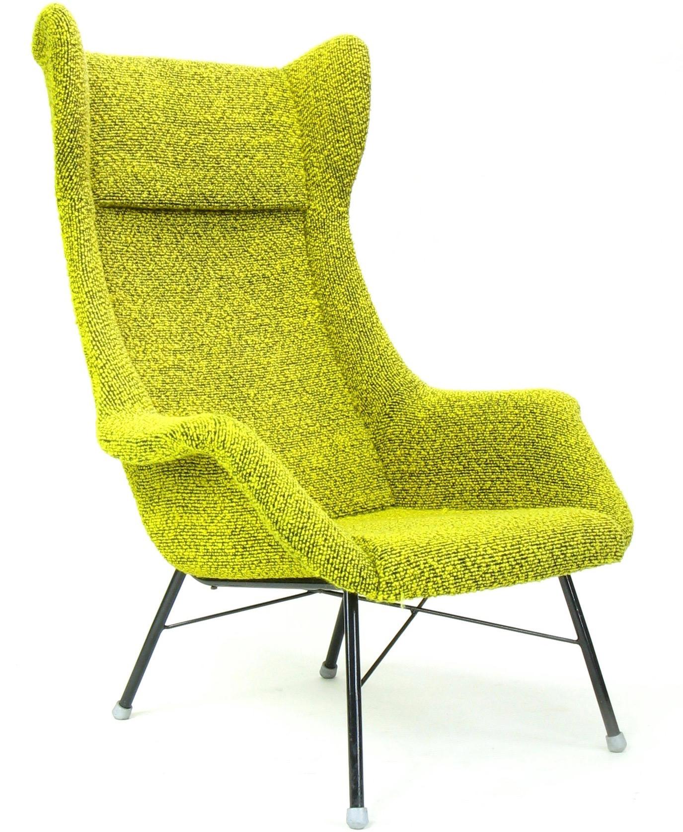 Absolutely unique Wingback armchair designed by Miroslav Navratil.
Produced by TON in Bystrice in the 1960s.
The original yellow/green material (sheep's wool boucle) was cleaned and is in excellent condition. 
