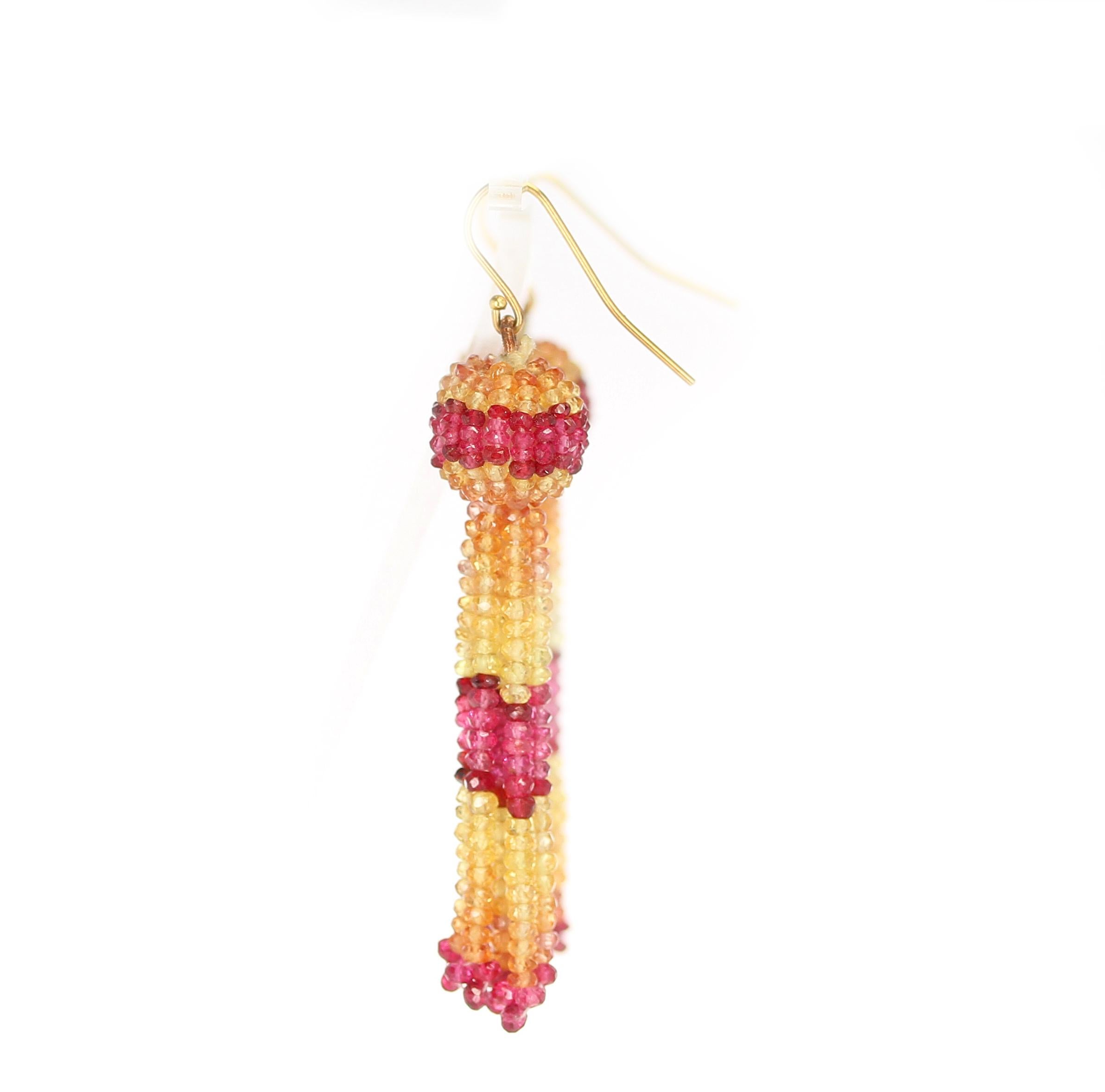 A beautiful pair of tassel earrings with shaded Faceted Yellow and Orange Sapphire Beads with Spinel. Yellow Gold. Weight: 59 cts. Necklace/Earring Set: Matching necklace available.