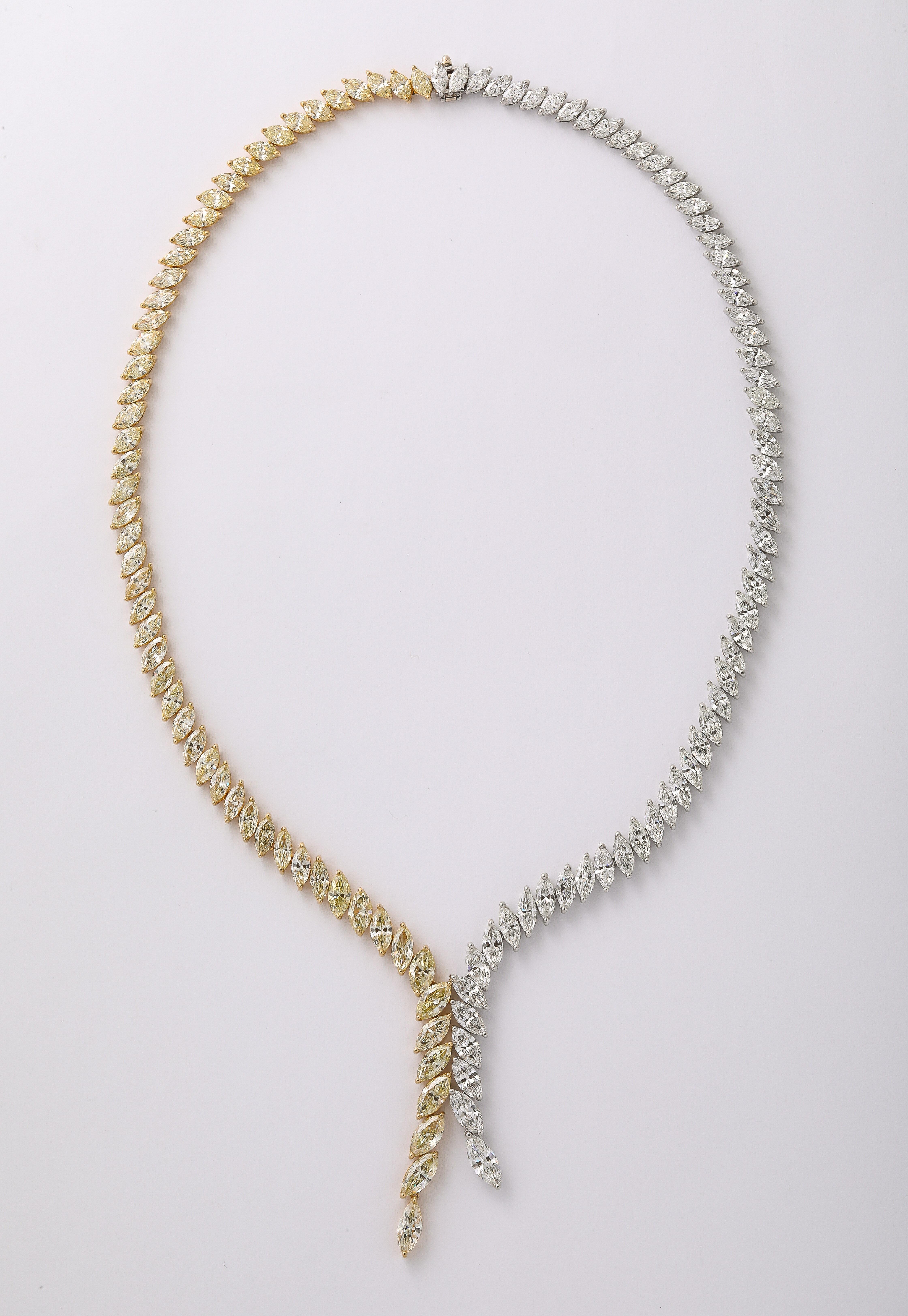 
A remarkable piece. 

40 carats of Yellow and White Marquise Diamonds set in platinum and 18k yellow gold.

A suite of matching yellow and white marquise diamonds is a rare find. 

16.5 inch length with a 2 inch drop, approximately. 