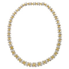 Halskette mit gelben und weißen Diamanten
