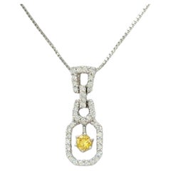 Collier pendentif en or blanc 18 carats avec diamants jaunes et blancs