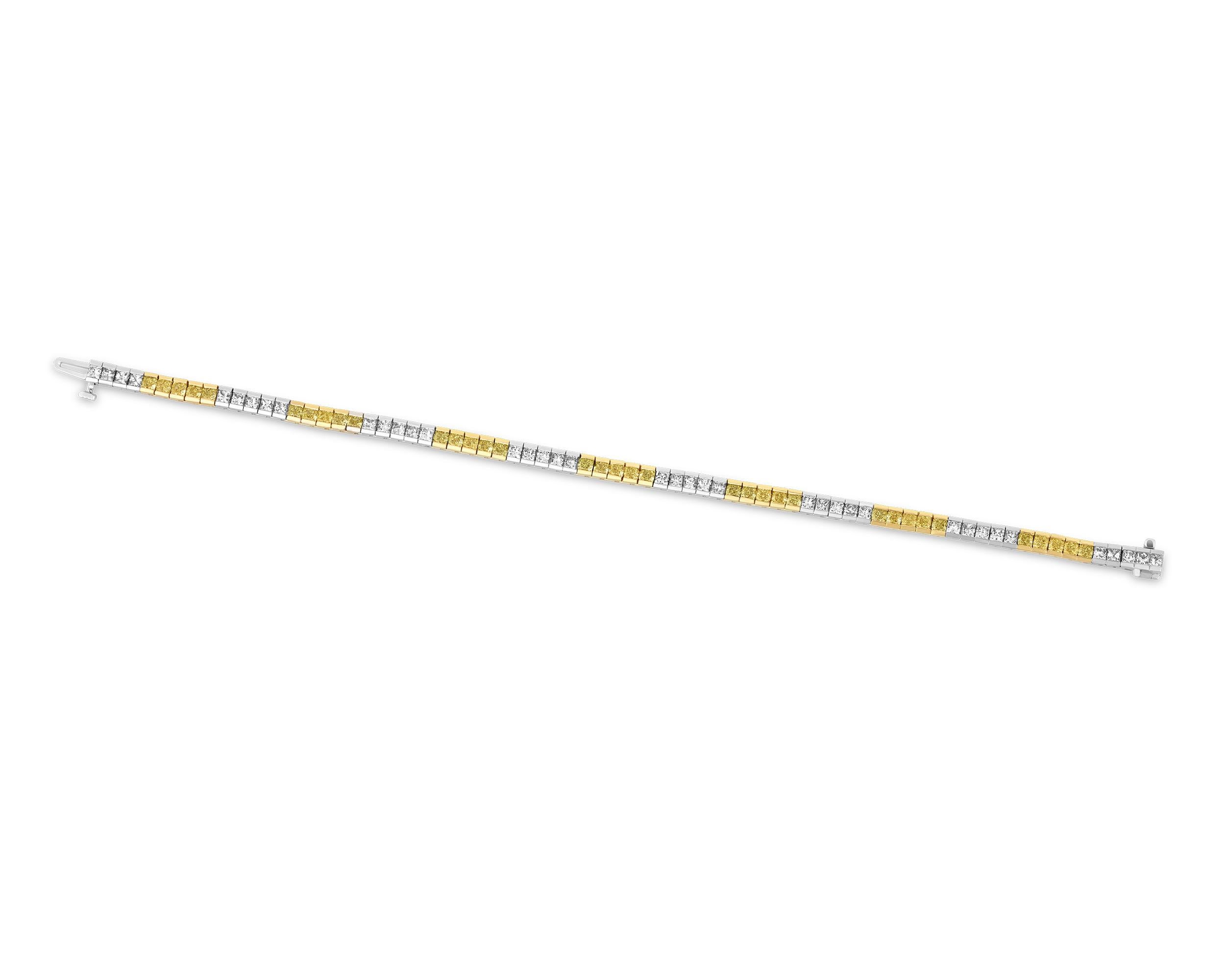 This elegant and sophisticated bracelet features yellow and white diamonds neatly arranged in a chic straight line. The thirty-five yellow diamonds total 3.80 carats and the thirty-nine white diamonds total 3.05 carats. The classic tennis bracelet
