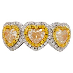 Bague à trois cœurs en or bicolore 18 carats avec diamants jaunes et blancs