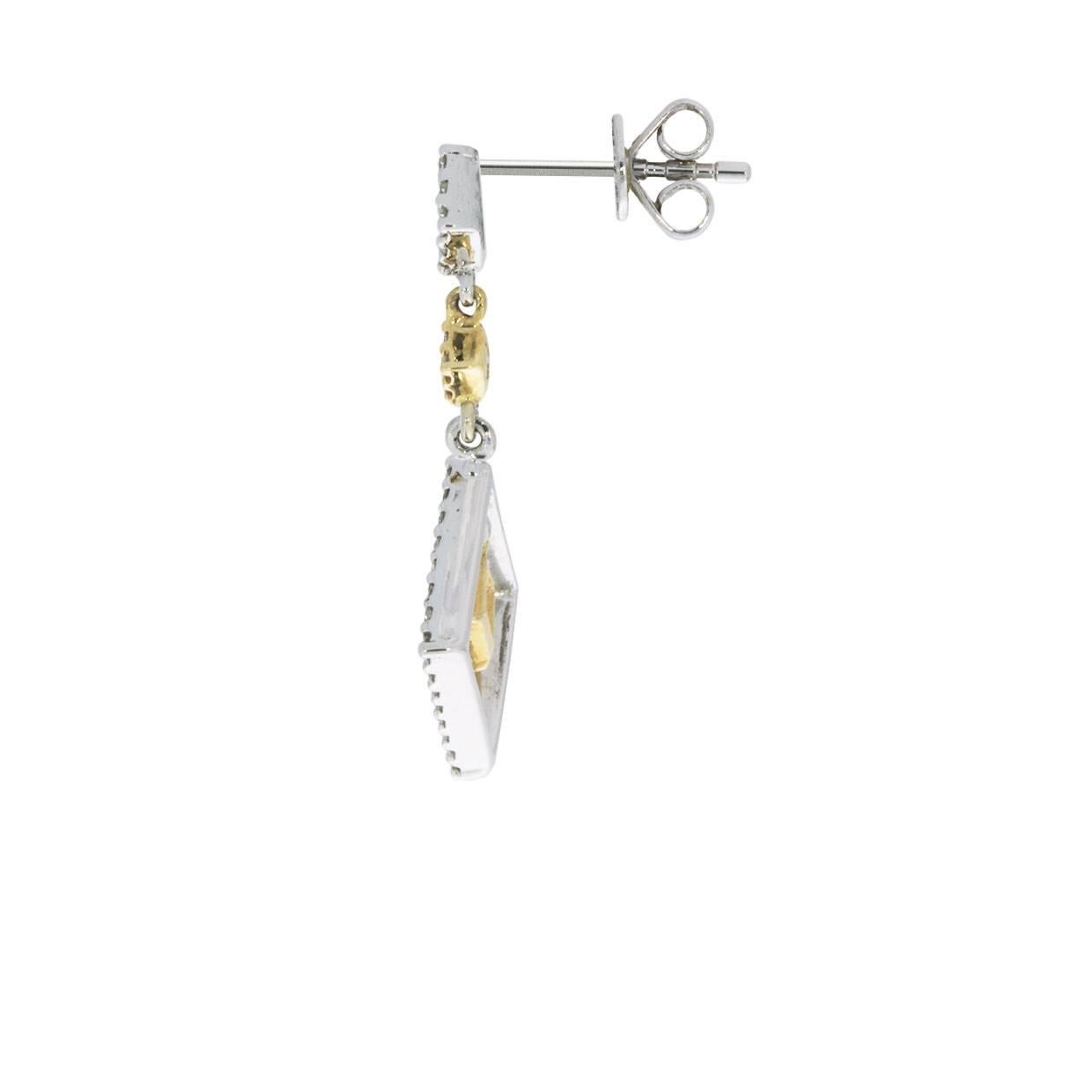 Item Details:
Estimated Retail - $2,000.00
Metal - 14 Karat White & Yellow Gold
Total Carat Weight (TCW) - 1.00 ctw
Style - Drop/Dangle Earrings
Fastening - Butterfly/Tension Backs
Length x Width - 25 X 14 mm
Beautiful Geometric Deco style design!
