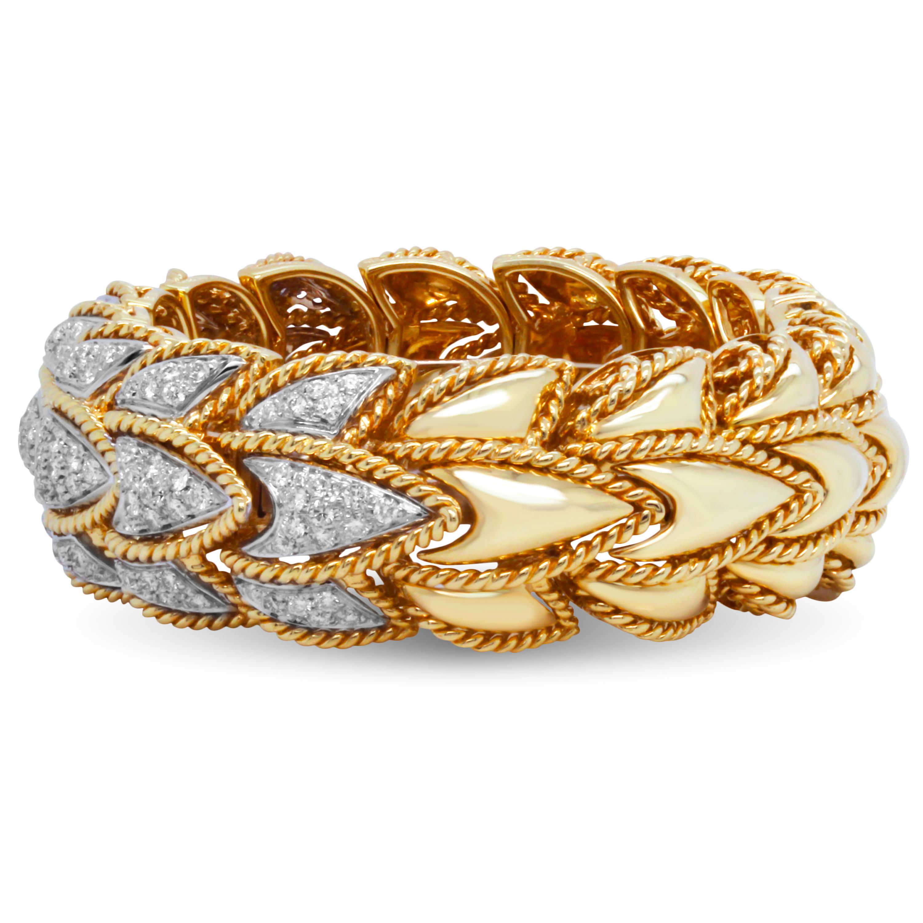 18k Yellow and White Gold Bangle Bracelet with Diamonds

This beautiful two-tone gold bangle bracelet features a simple, yet unique design that gives it a distinct, luxurious look. The bracelet is slightly flexible and is open underneath. 

 Apprx.