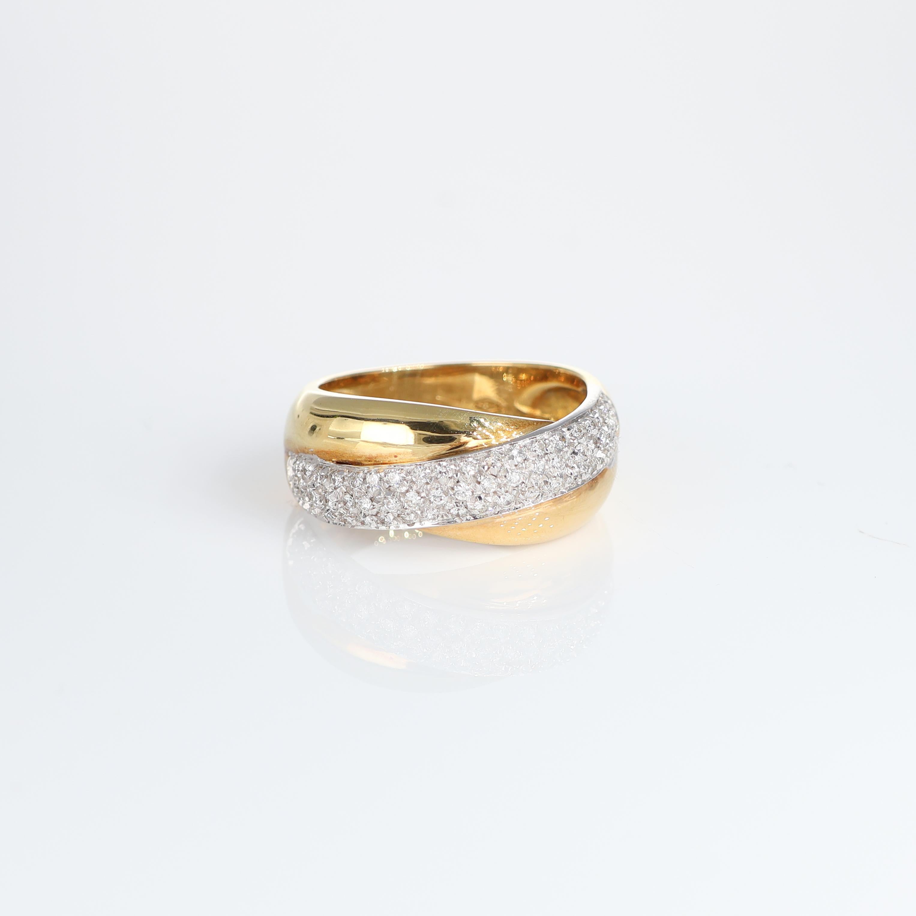 IMPORTANT NOTE:
✔ No additional costs will be added to this order.
✔ Shipping and customs duties are fully covered by us.
--------------------
This elegant 18kt Yellow gold band ring features a sophisticated crossover design, enhanced by a dazzling