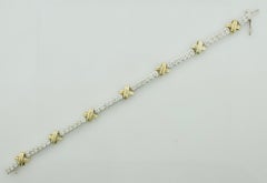 Bracelet tennis « X » en or jaune et blanc avec diamants de 3,75 carats