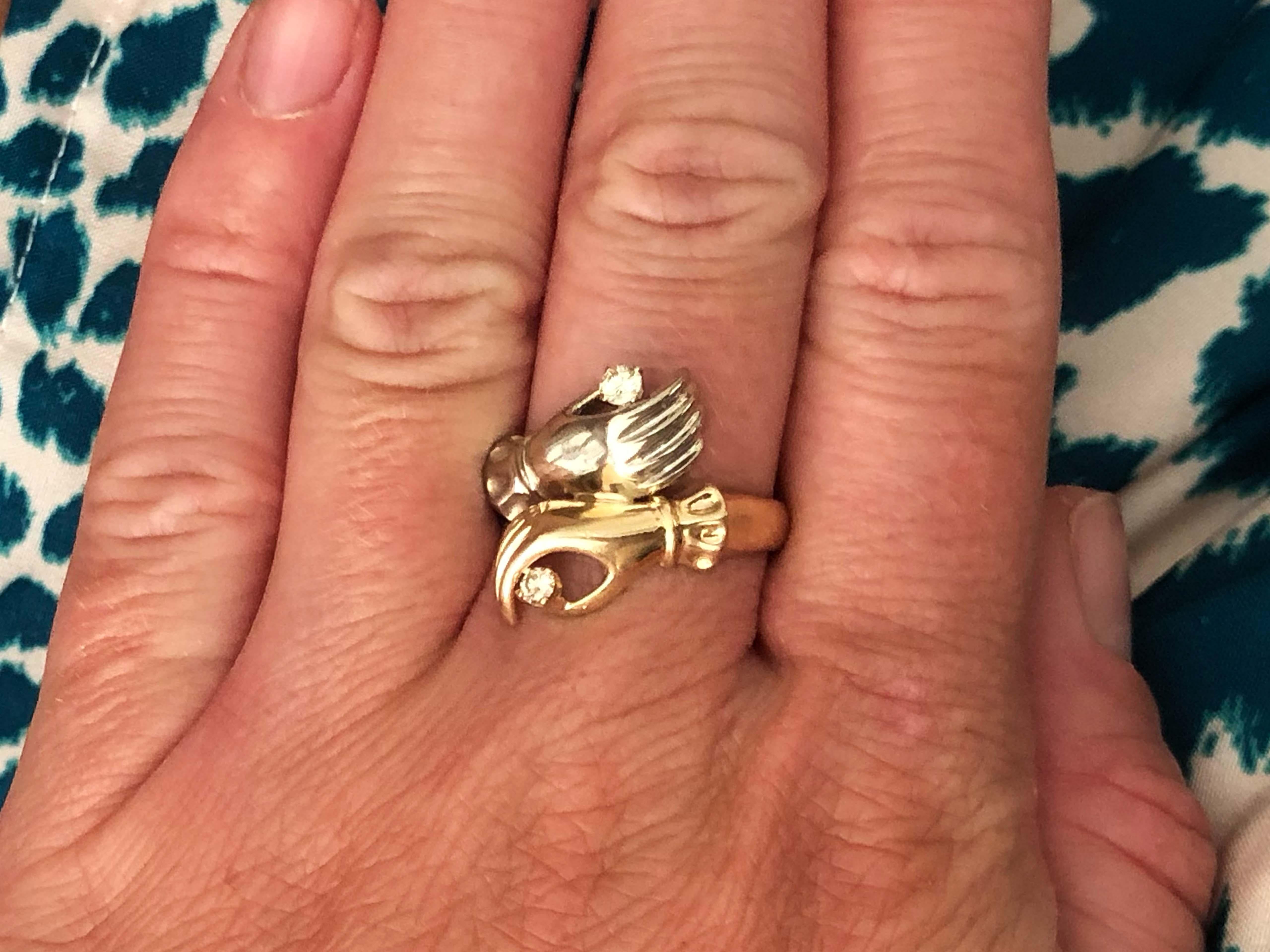Item Specifications:



Metal: 14K Yellow and White Gold



Size: 8.5


Total Weight: 5.8 Grams


Diamond Count: 2 Round brilliant cut


Total Diamond Weight: 0.16 carats


Diamond Color: One diamond is G-H, one is light yellow
 

Diamond Clarity: