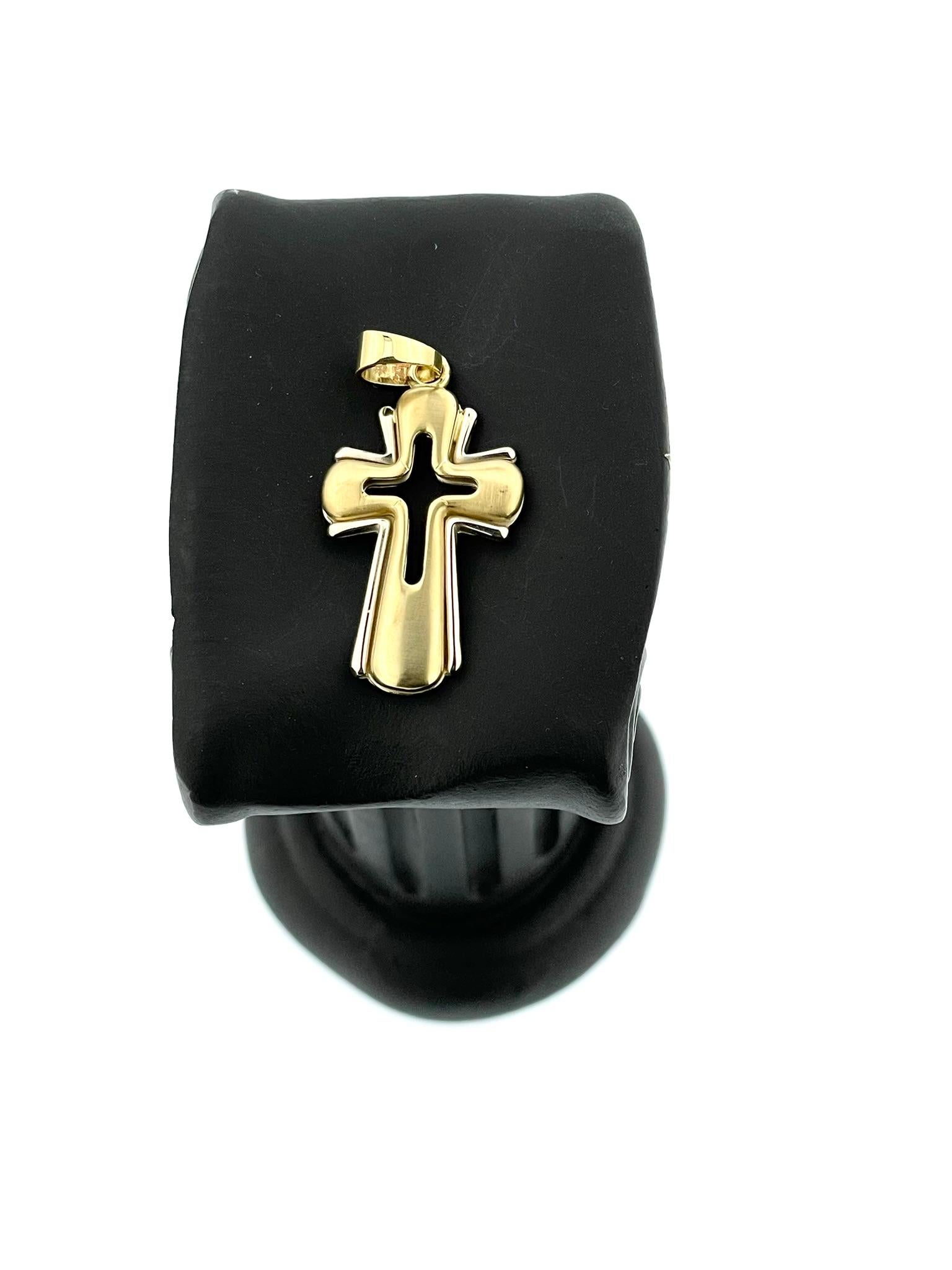 The Yellow and White Gold Italian Cross Satiné, crafted in 18kt gold, epitomizes Italian craftsmanship and elegance. With its satiné finish, this cross exudes a subtle, luxurious sheen that adds depth and texture to its surface.

Italian jewelry is