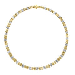 Halskette mit gelben und weißen ovalen Diamanten