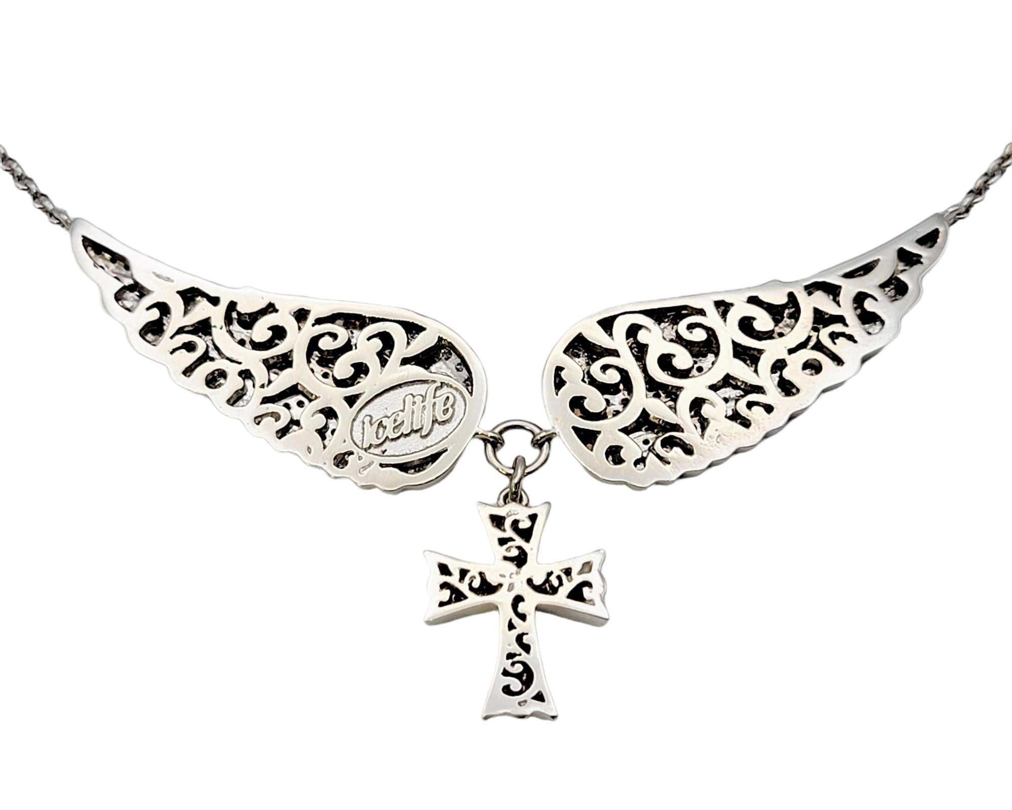Women's Yellow and White Pave Diamond Cross and Wings Necklace in 14 Karat White Gold For Sale
