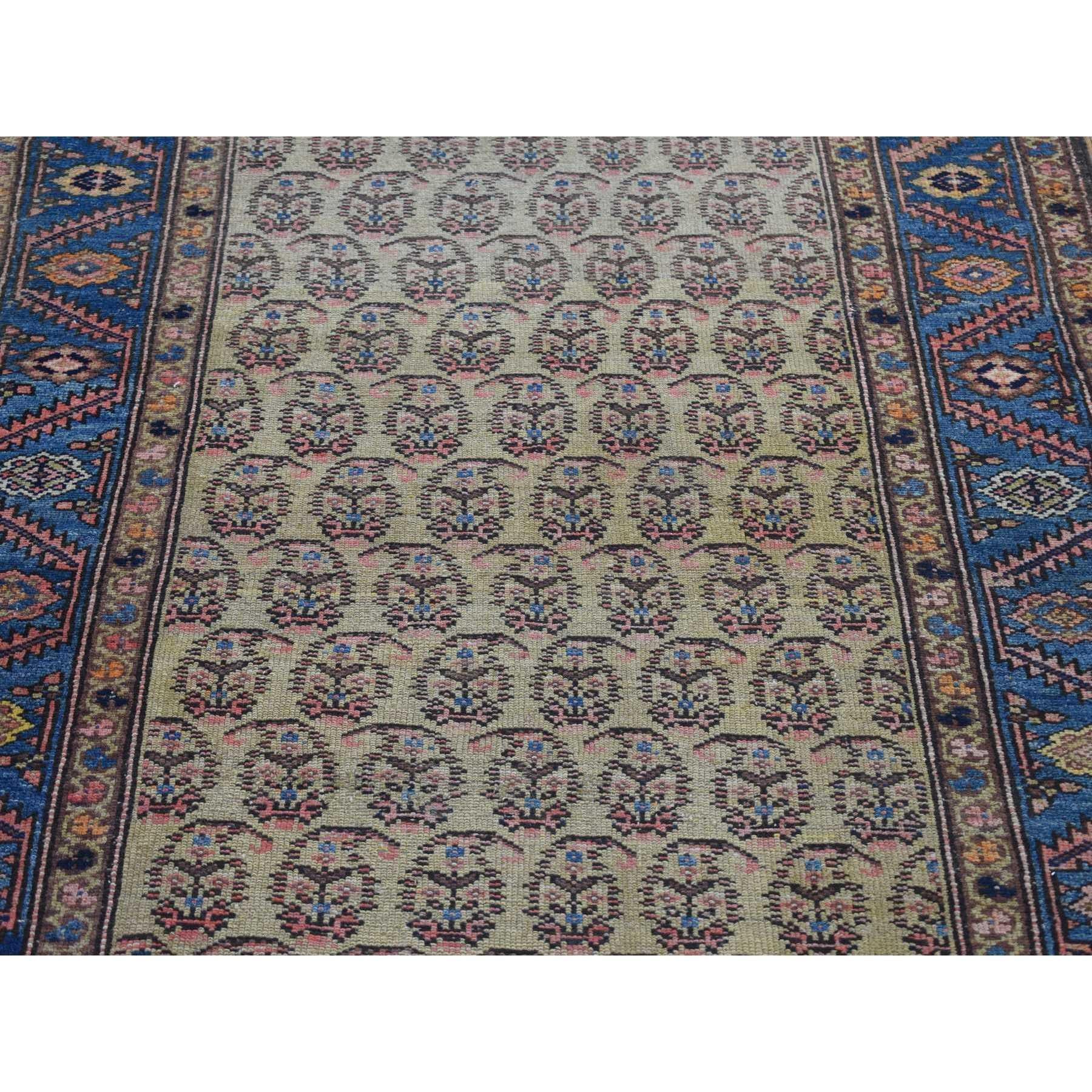 Yellow Antique Persian Bakshaish Abrash Paisley Design Wool Hand Knotted Rug In Good Condition For Sale In Carlstadt, NJ