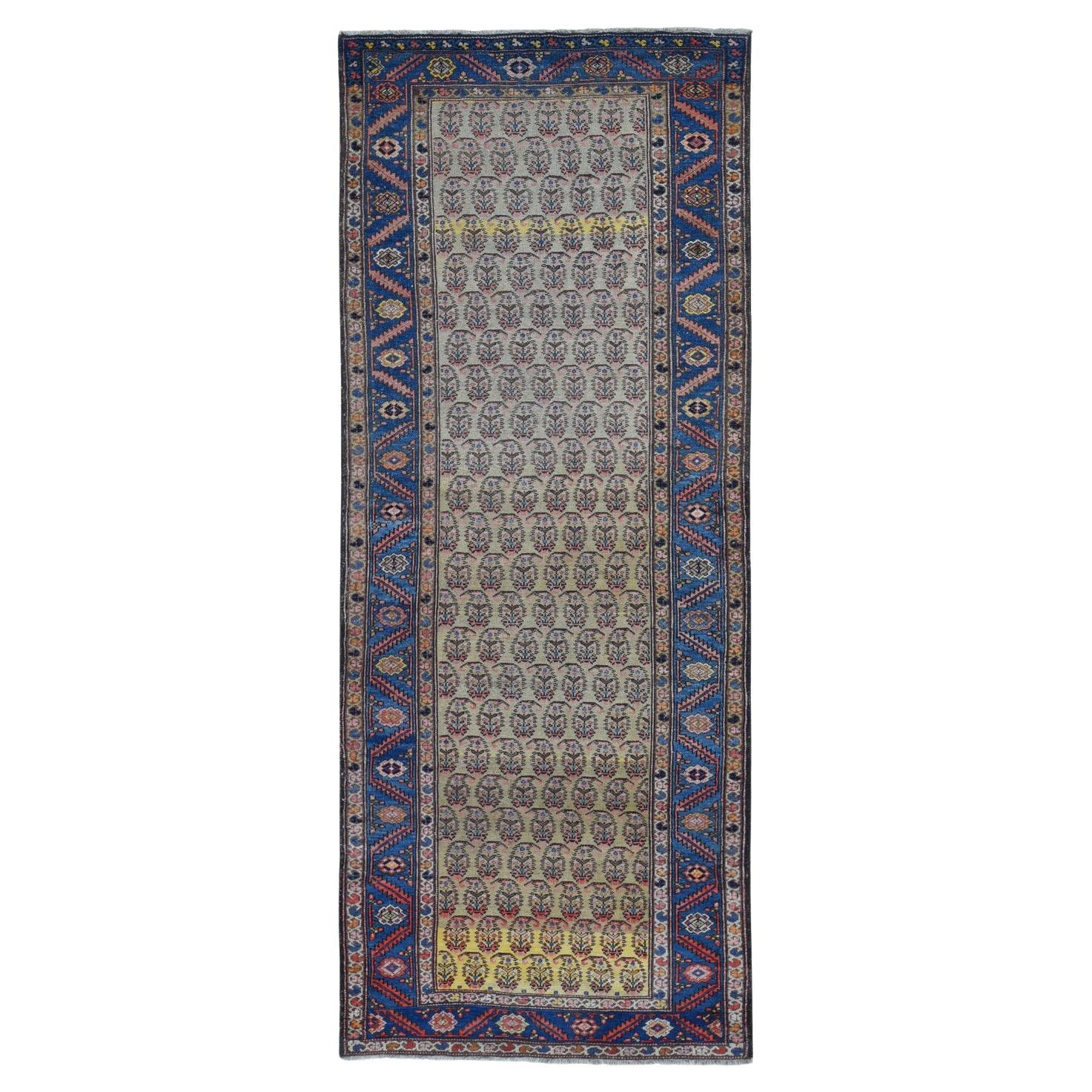 Yellow Antique Persian Bakshaish Abrash Paisley Design Wool Hand Knotted Rug For Sale