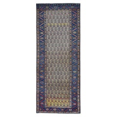 Gelber antiker persischer Bakshaish-Abrash-Teppich aus Wolle mit Paisleymuster, handgeknüpft
