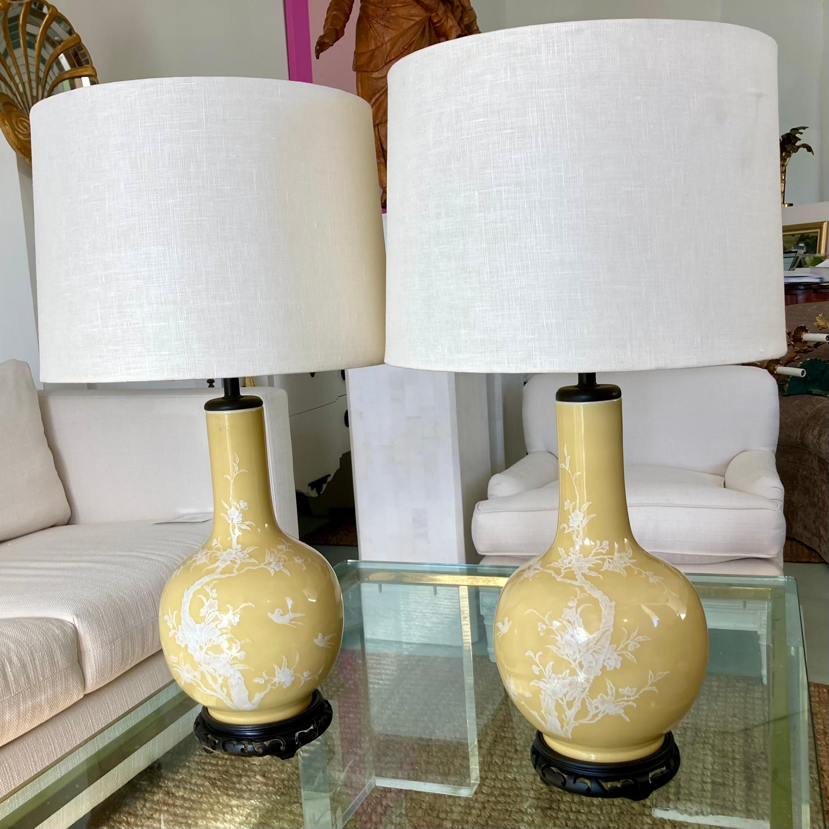 Mid-20th Century Yellow Asian Chinoiserie Table Lamps on Carved Wood Bases, a Pair For Sale