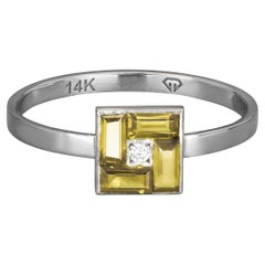 Anello con baguette gialla in oro 14k