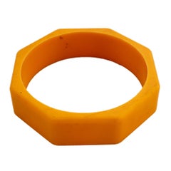 Yellow bakelite bangle in octagon shape, France fifties