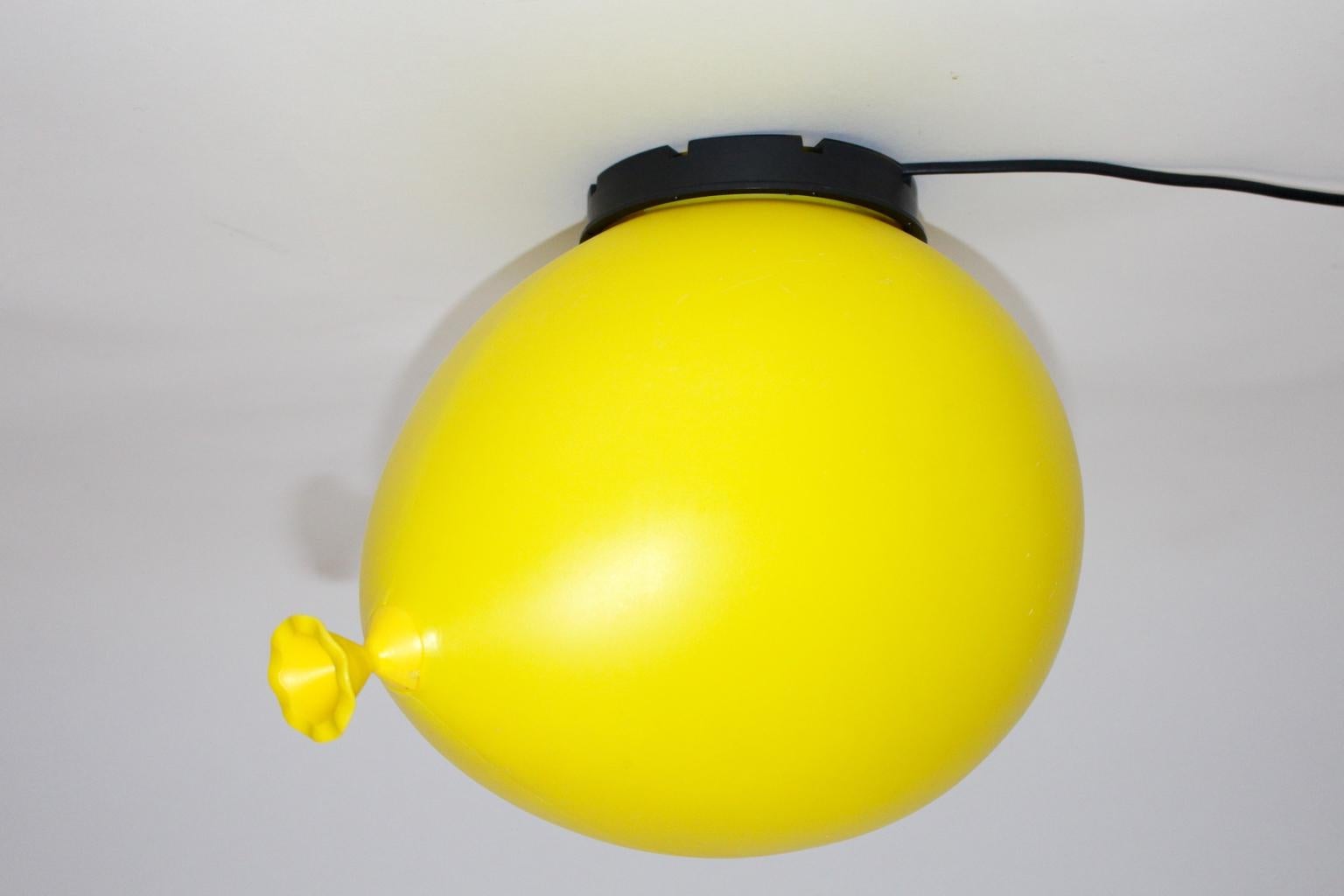 Modern pop art vintage table lamp, sconce or ceiling light from plastic in yellow color by Yves Christin for Bilumen Italy, 1980s.
An amazing balloon - like lighting which is ready to use as table lamp, sconce or ceiling light.
Stamped underneath