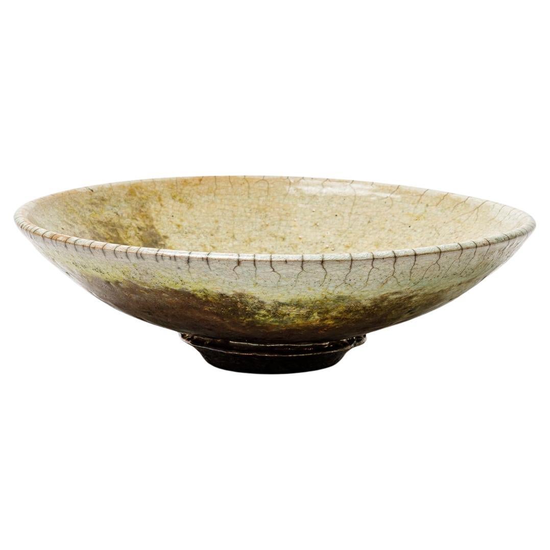 Yellow/beige glazed ceramic cup with metallic highlights by Gisèle Buthod Garçon For Sale