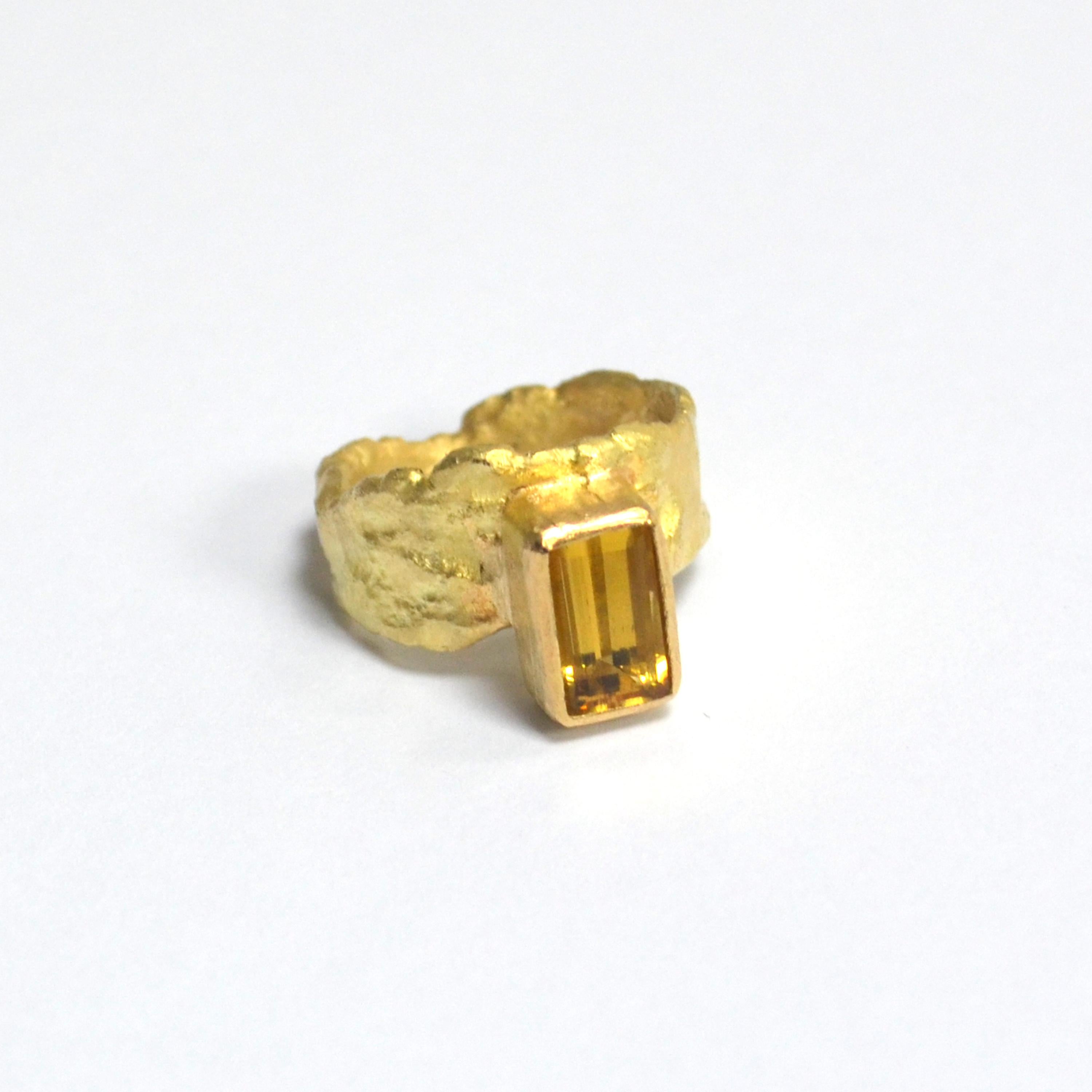Octagon yellow beryl wide gold textured ring. 

The band narrows at the back for comfort, 11m at widest point, 3mm at narrowest. The gem stone measures 10mmx6mm and is 1.87 cts.

Disa Allsopp makes by hand each ring using traditional reticulation